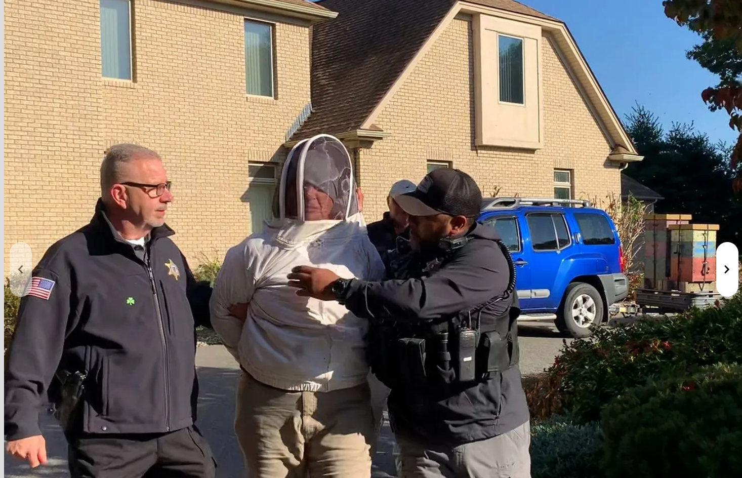 She put on a beekeeper’s suit before trying to open a second case of bees, authorities said