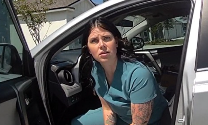 Moment fake nurse who treated 4,000 patients without a license is arrested by police