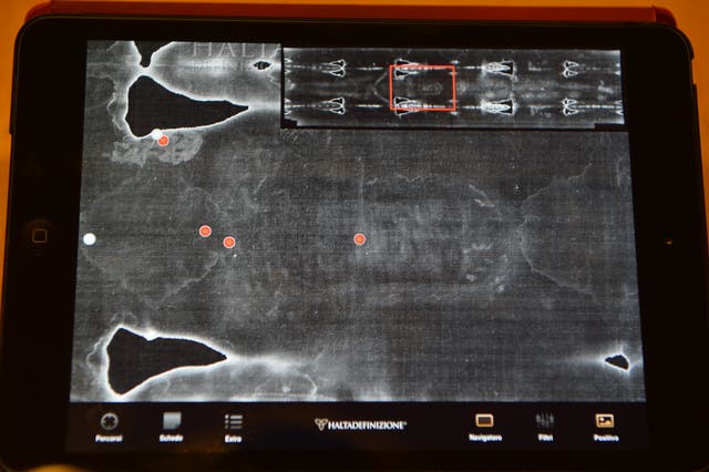 <p>Tablet screen displaying a picture of the Shroud of Turin</p>