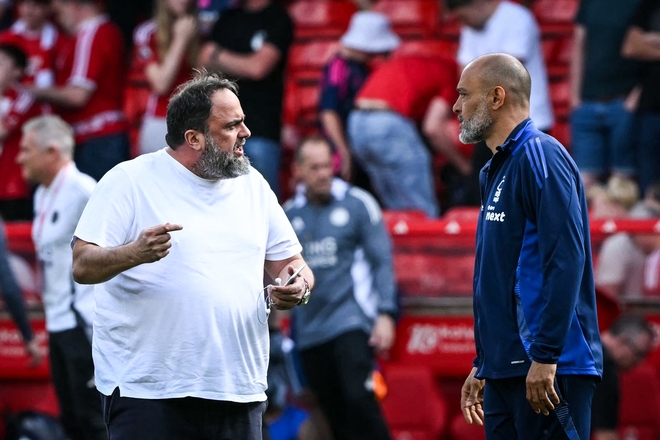 Evangelos Marinakis (left) with Forest boss Nuno Espirito Santo