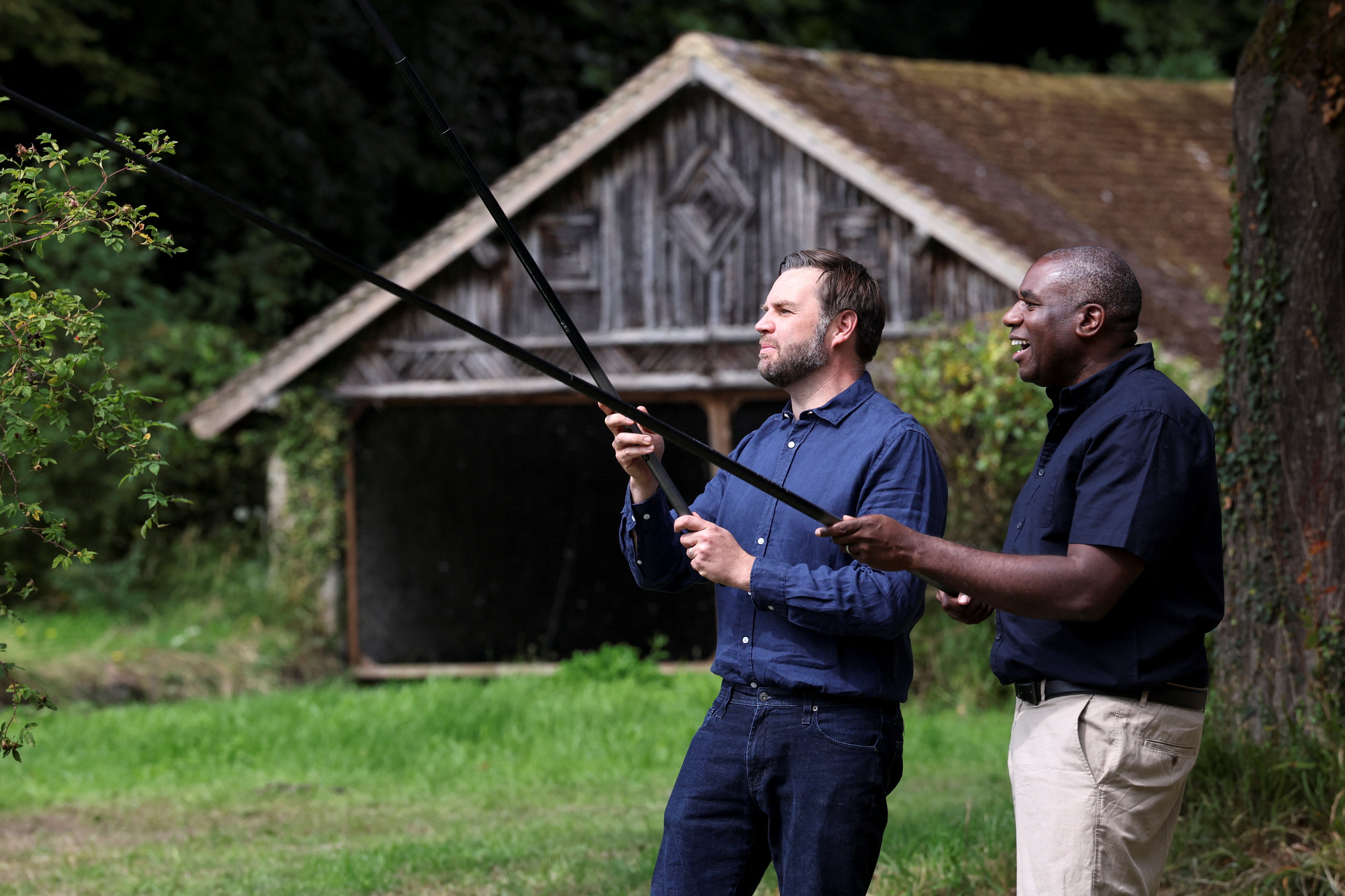 David Lammy, right, and JD Vance fishing at Chevening House
