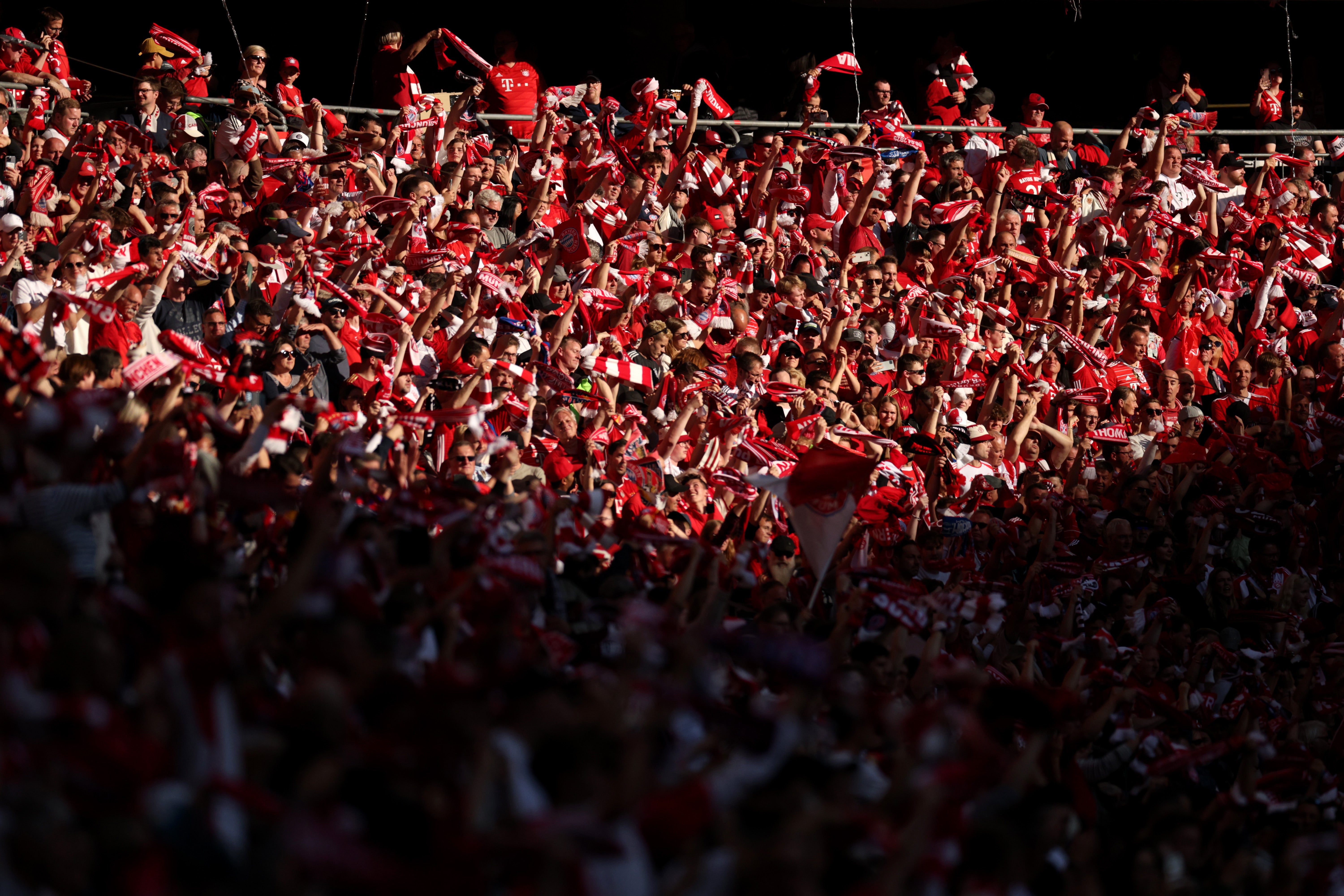 Fans of Bayern Munich show their support in the stands