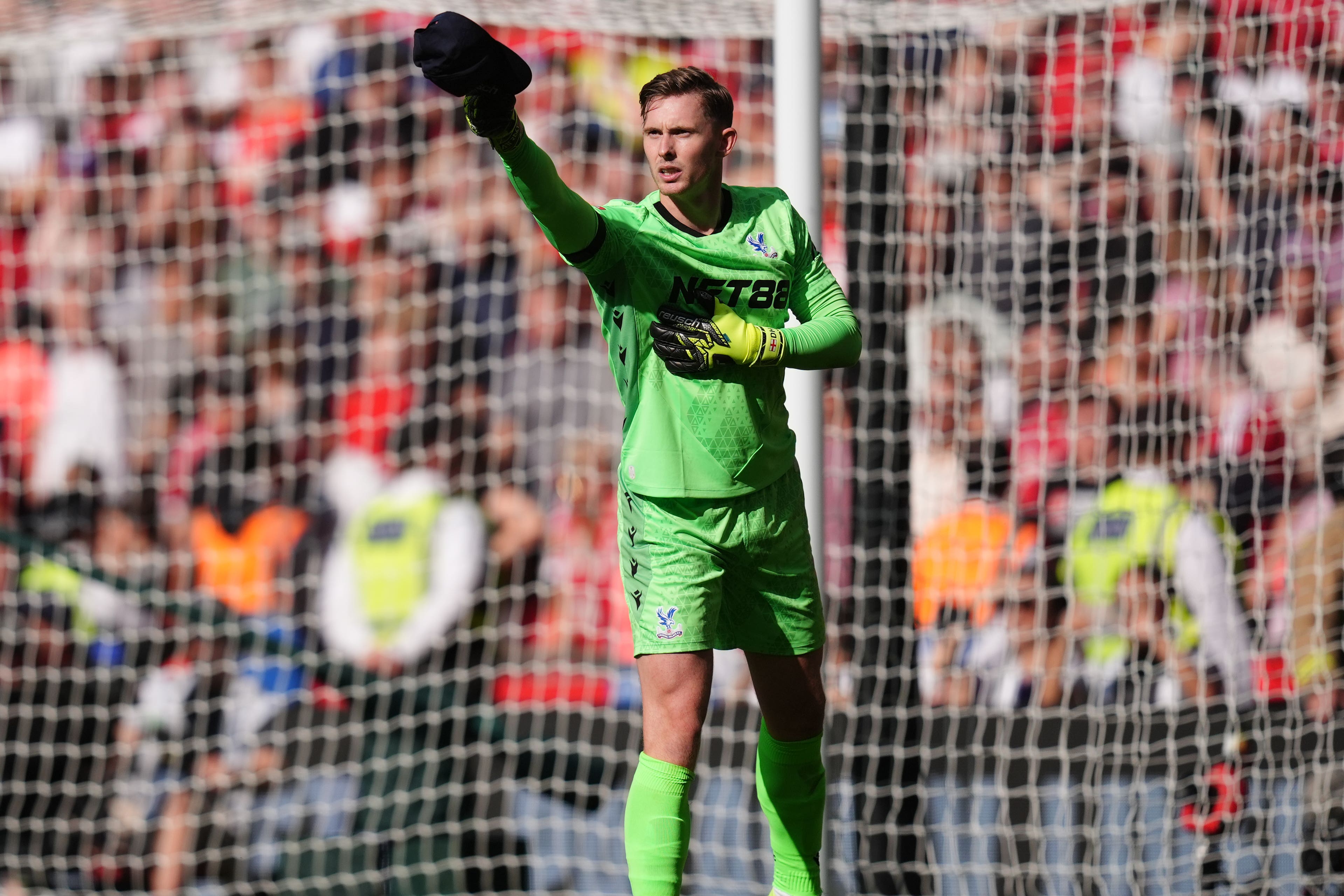 Dean Henderson celebrates after saving during the shoot-out (John Walton/PA)