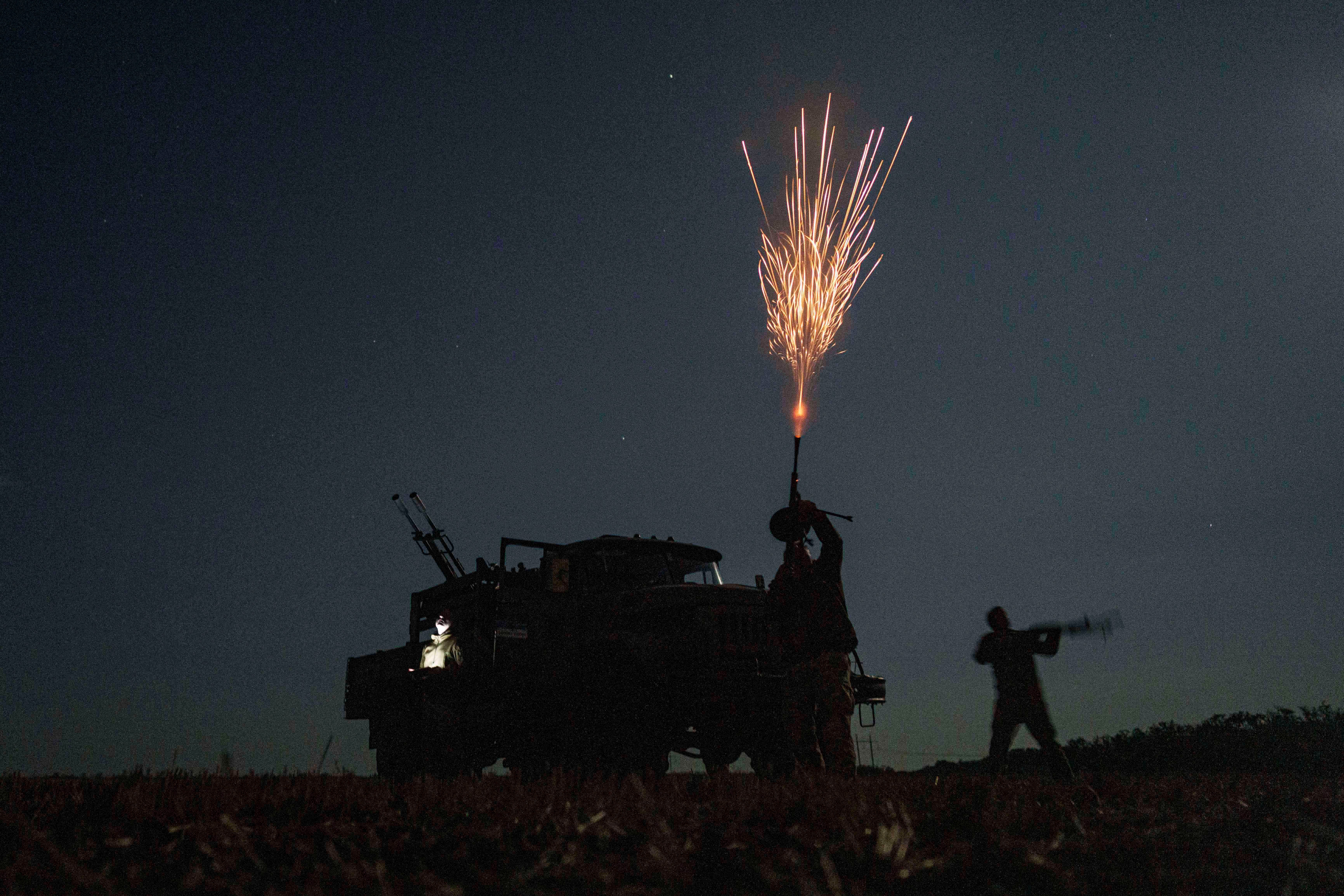 Ukrainian soldiers from air-defence unit of 59th brigade fire at Russian strike drones in Dnipropetrovsk region