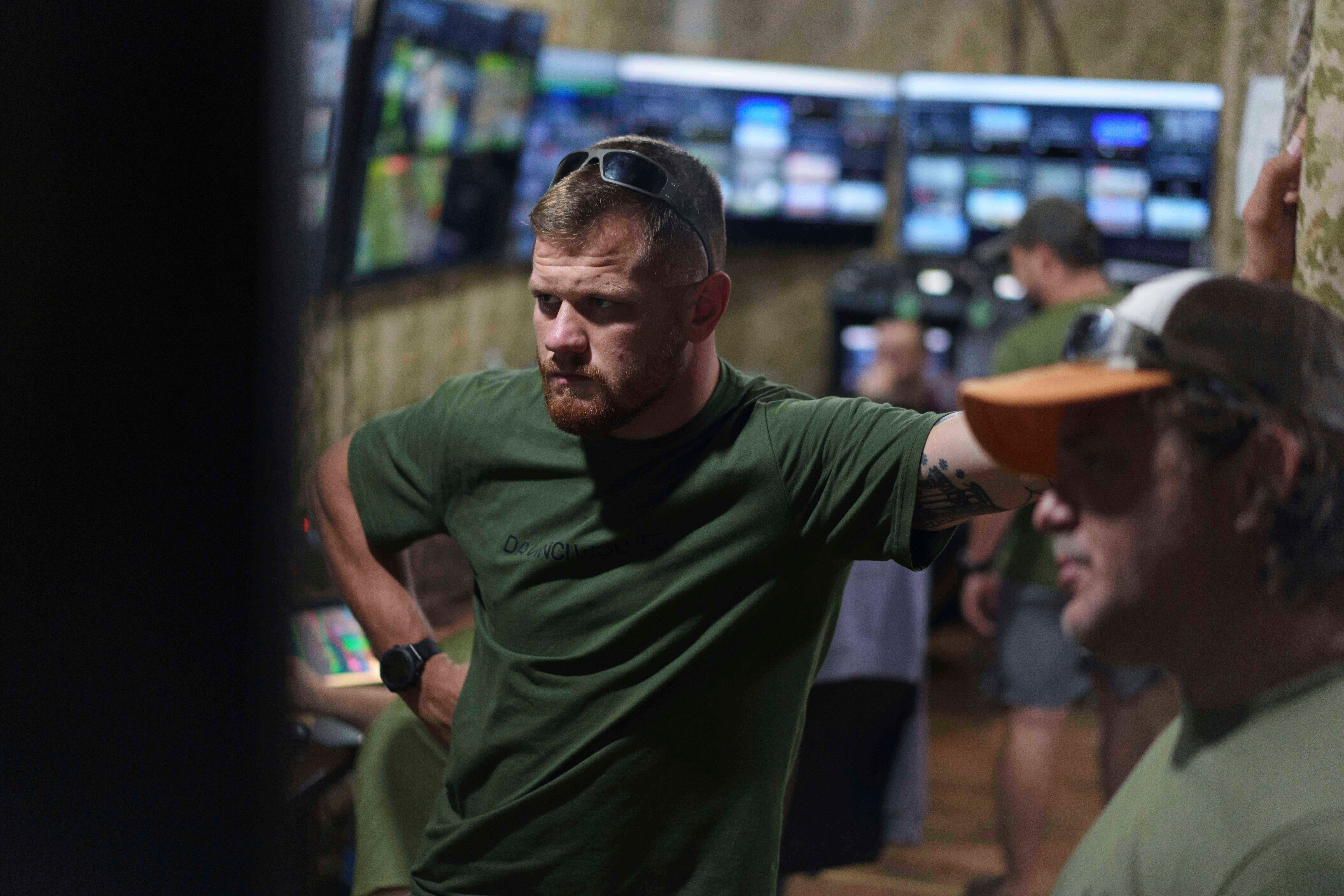 Serhii Filimonov, commander of the Da Vinci Wolves Battalion looks on a live stream from the frontline during fighting with Russian on Pokrovsk direction, Ukraine, Saturday, Aug. 9, 2025. (AP Photo/Evgeniy Maloletka)