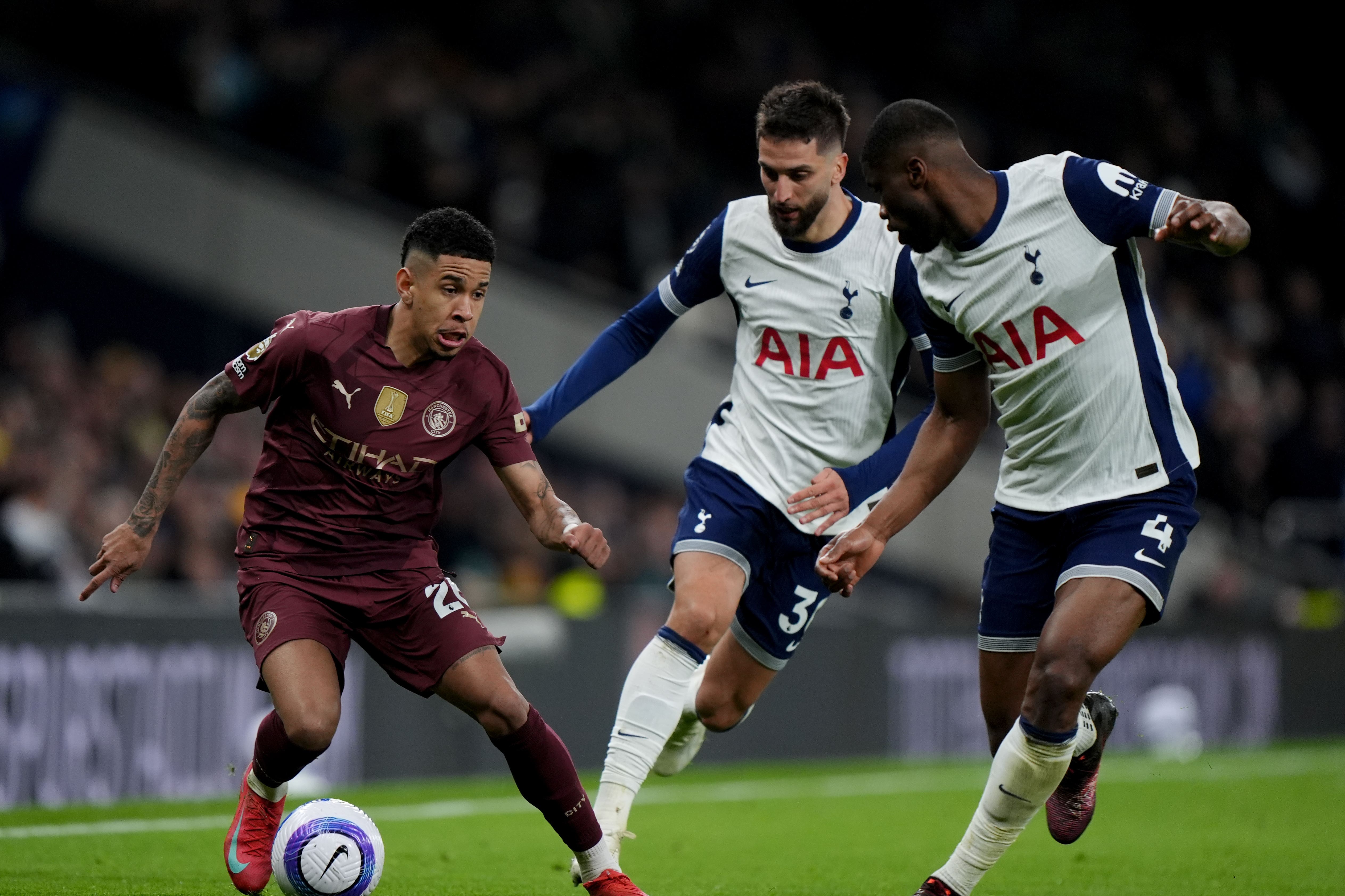 Savinho (left) looks set to stay at Manchester City