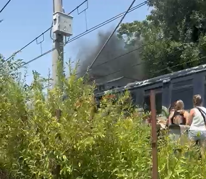 Passengers clambered off the train as the smoke continued to thicken