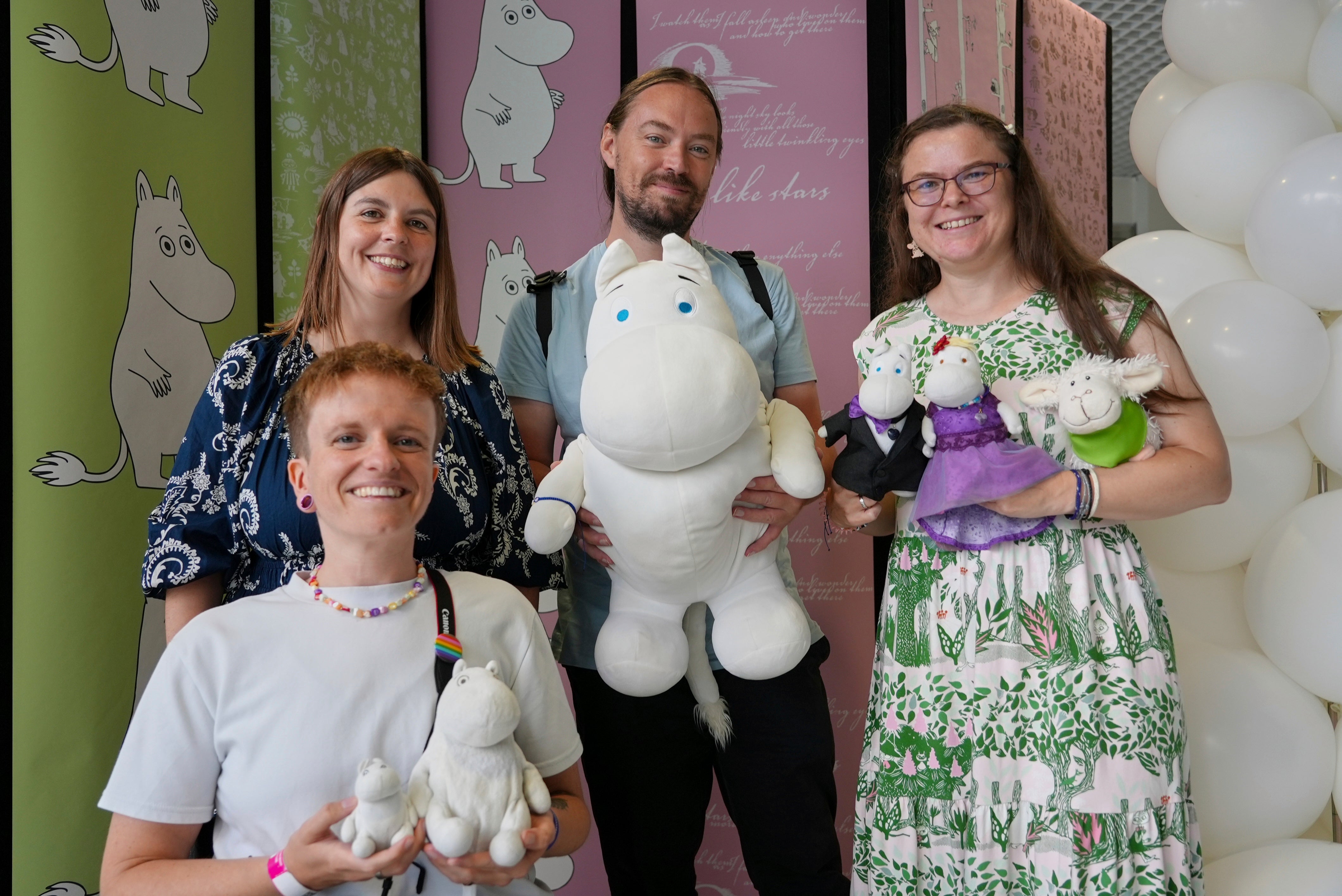 Moomins fans with their toys as they celebrate the cartoon’s 80th birthday