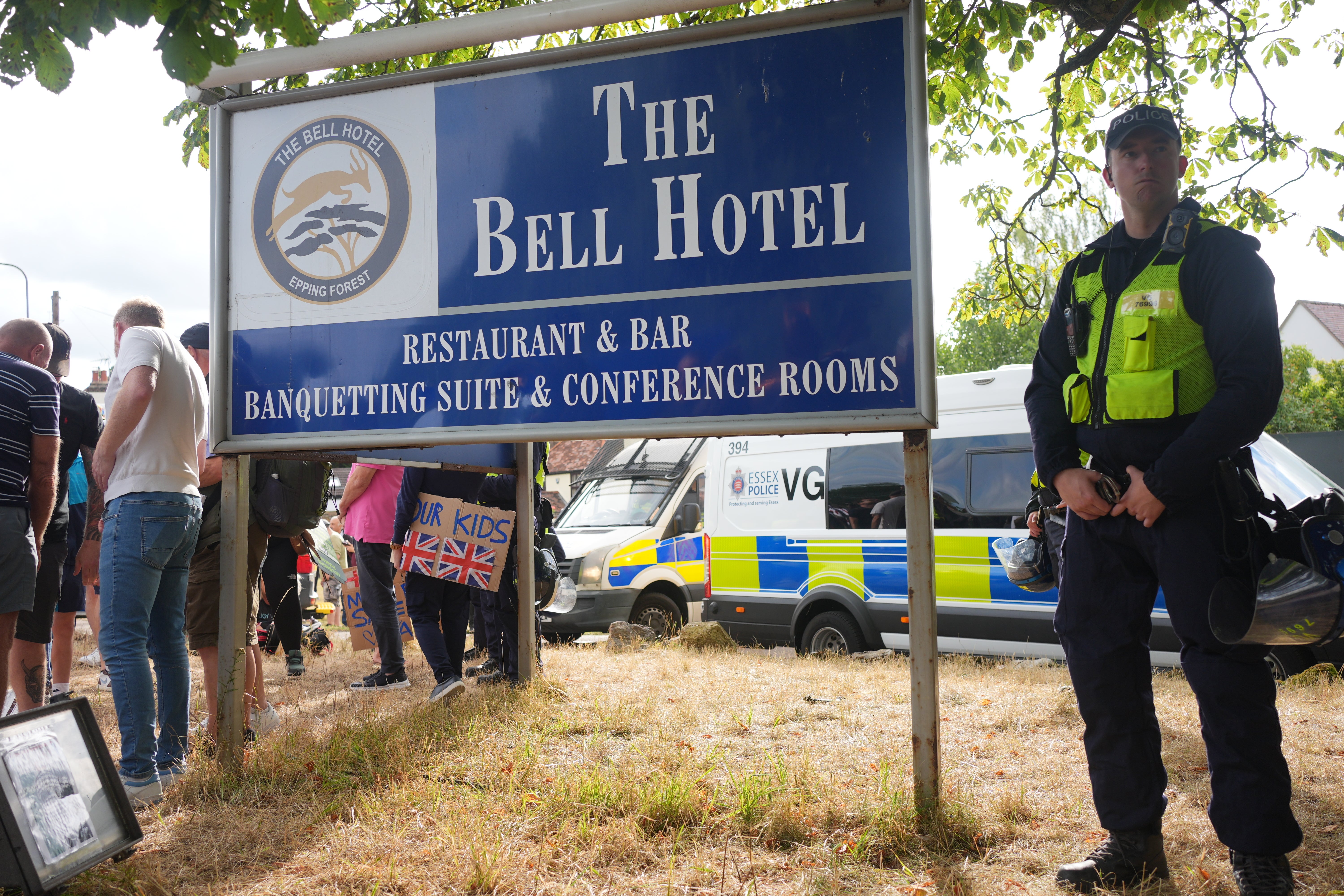 Police outside the Bell Hotel in Epping, Essex where there has been a number of demonstrations (Yui Mok/PA)