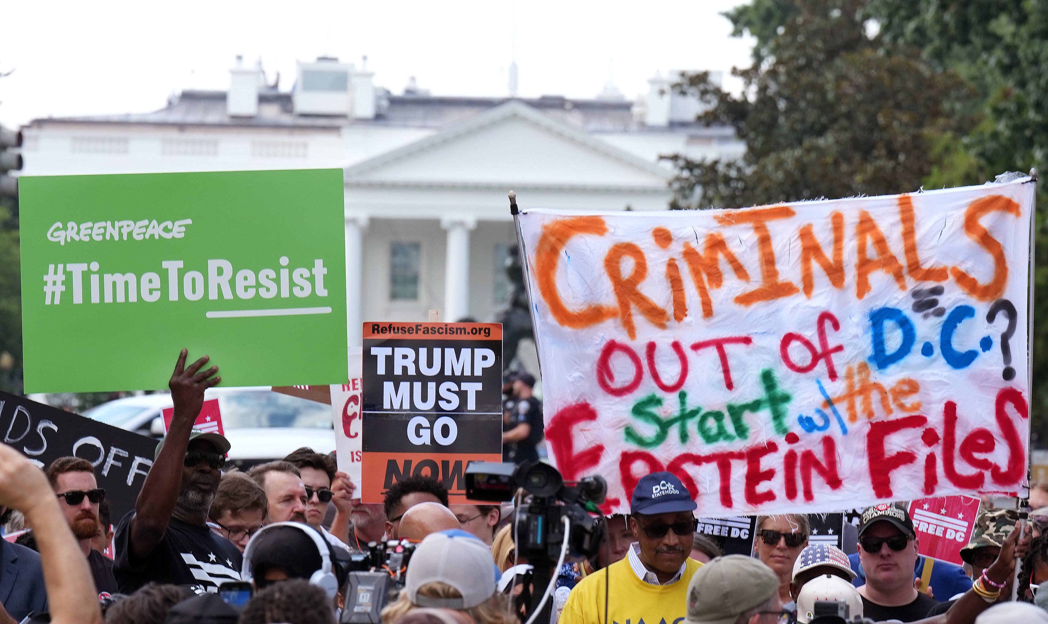 Protesters against Trump’s administration gather outside the White House on Monday to oppose his latest ‘anti-crime’ measures