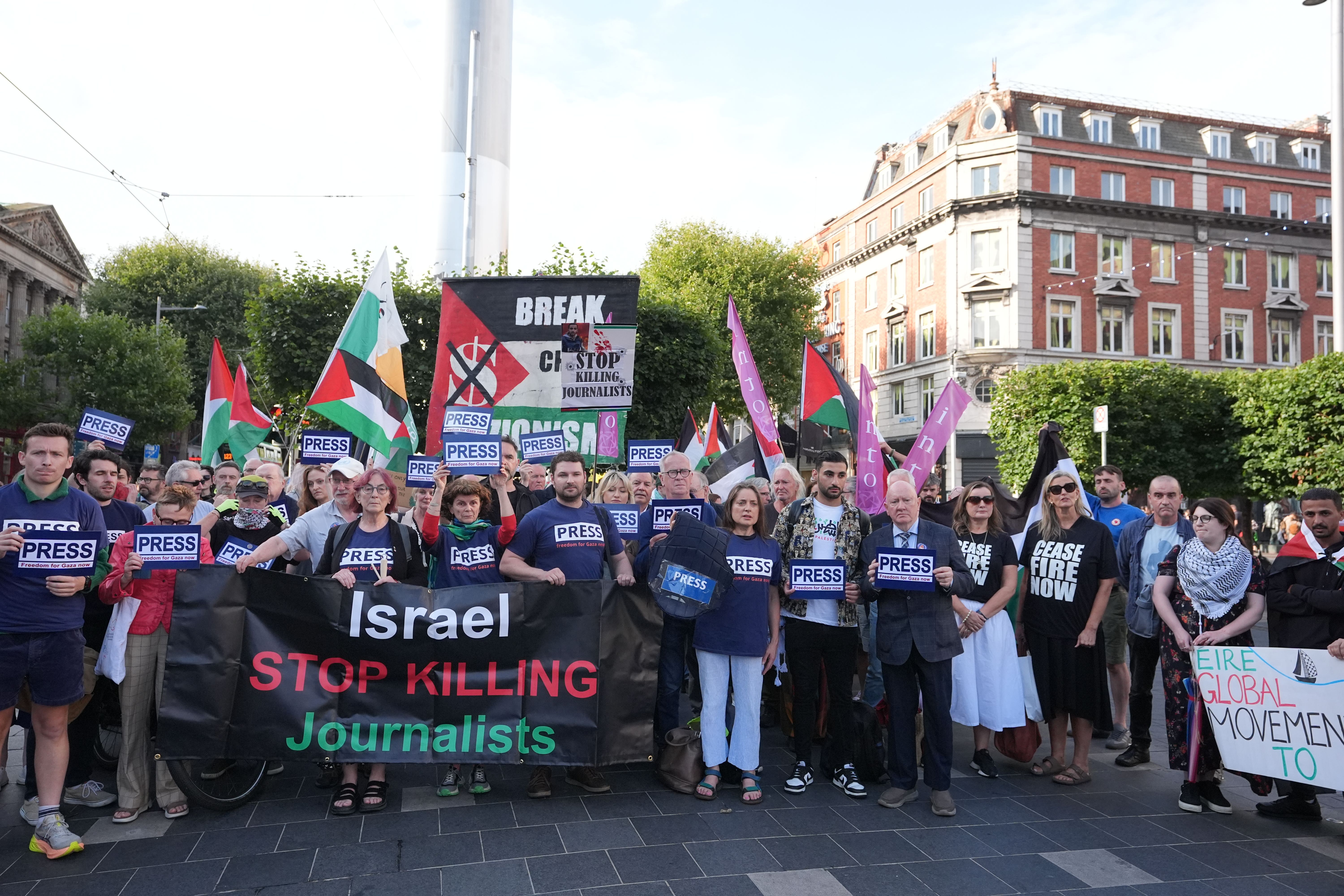 Members of the NUJ and fellow journalists take part in a protest organised by the NUJ at The Spire in O’Connell Street, Dublin, to condemn the killing of journalists due to Israeli attacks, including five men on Sunday (Niall Carson/