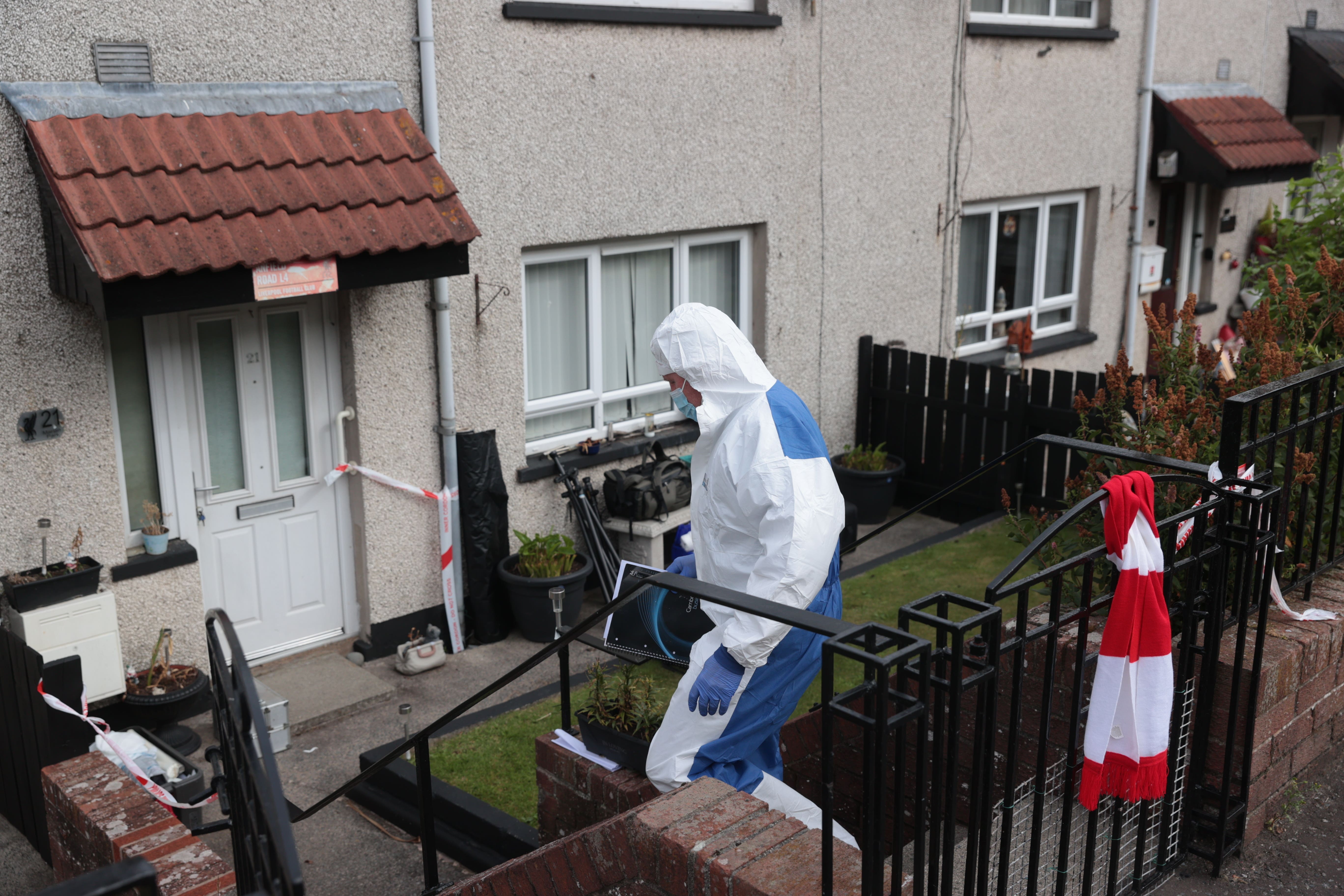 A Police Service of Northern Ireland scene of crime officer at the scene in the Marian Park area of Downpatrick (Liam McBurney/PA)