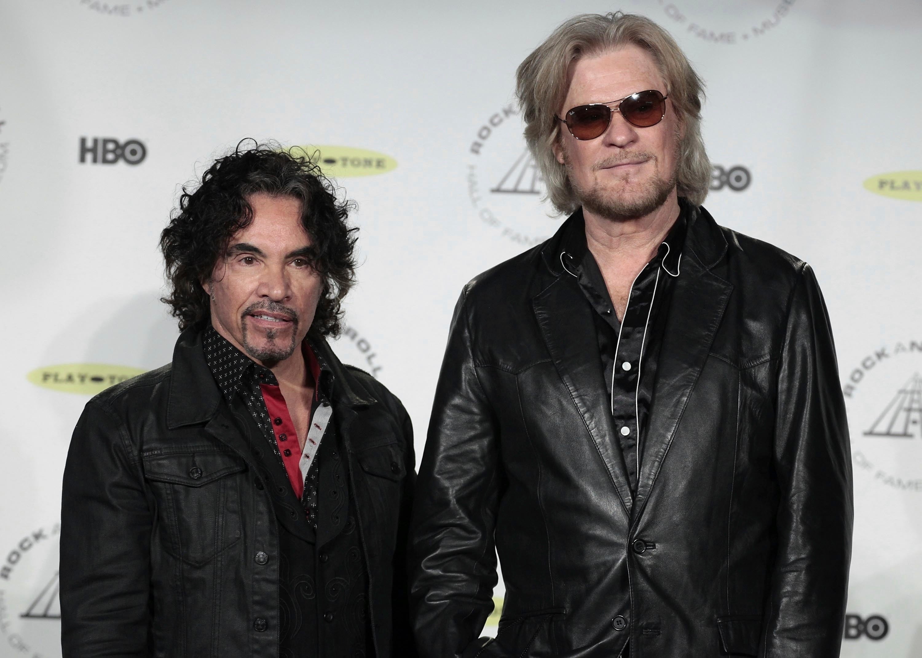 Hall of Fame Inductees John Oates, left, and Daryl Hall appear in the press room at the Rock and Roll Hall of Fame Induction Ceremony in 2014 in New York