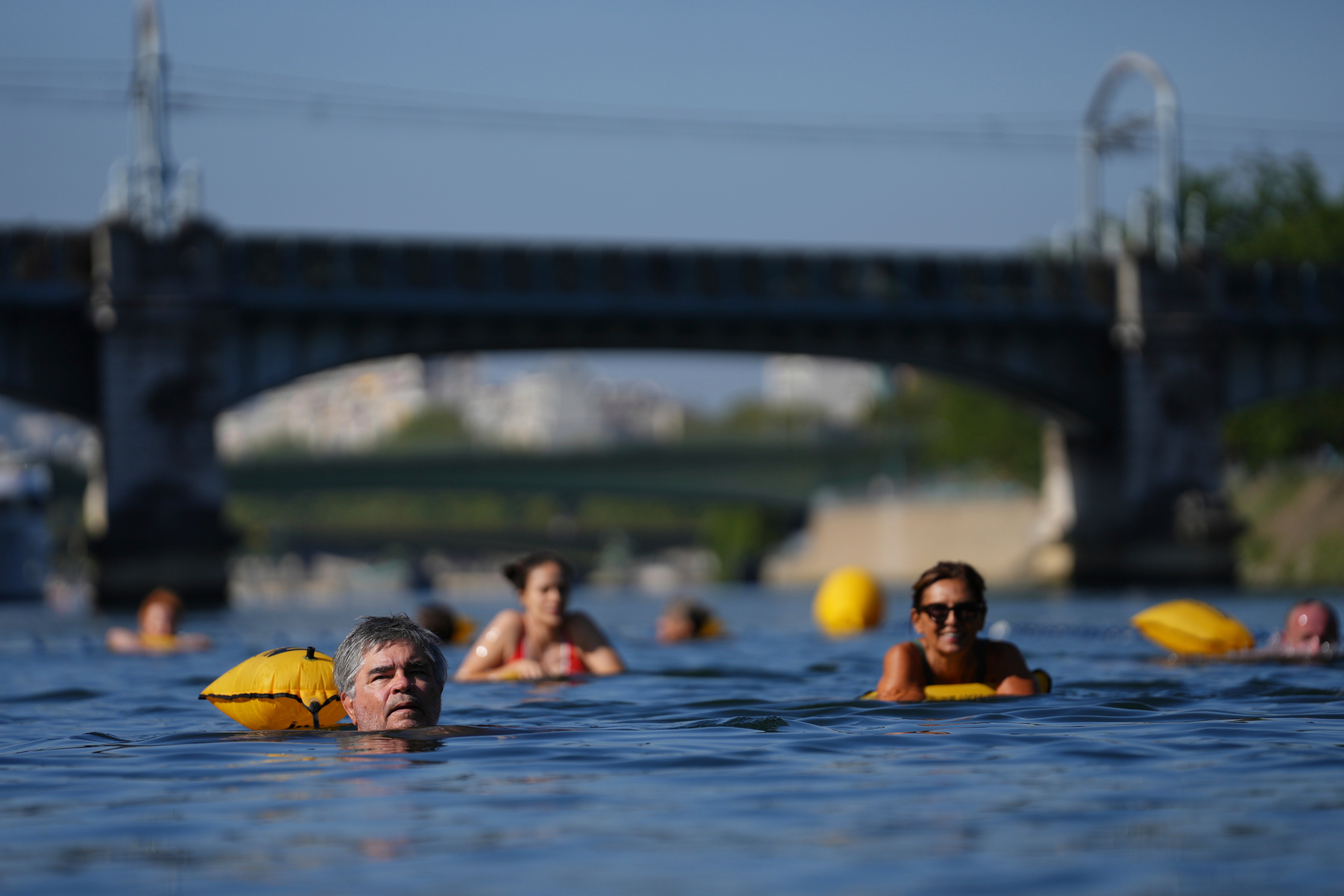 Swimmers must wear a yellow buoy for safety reasons