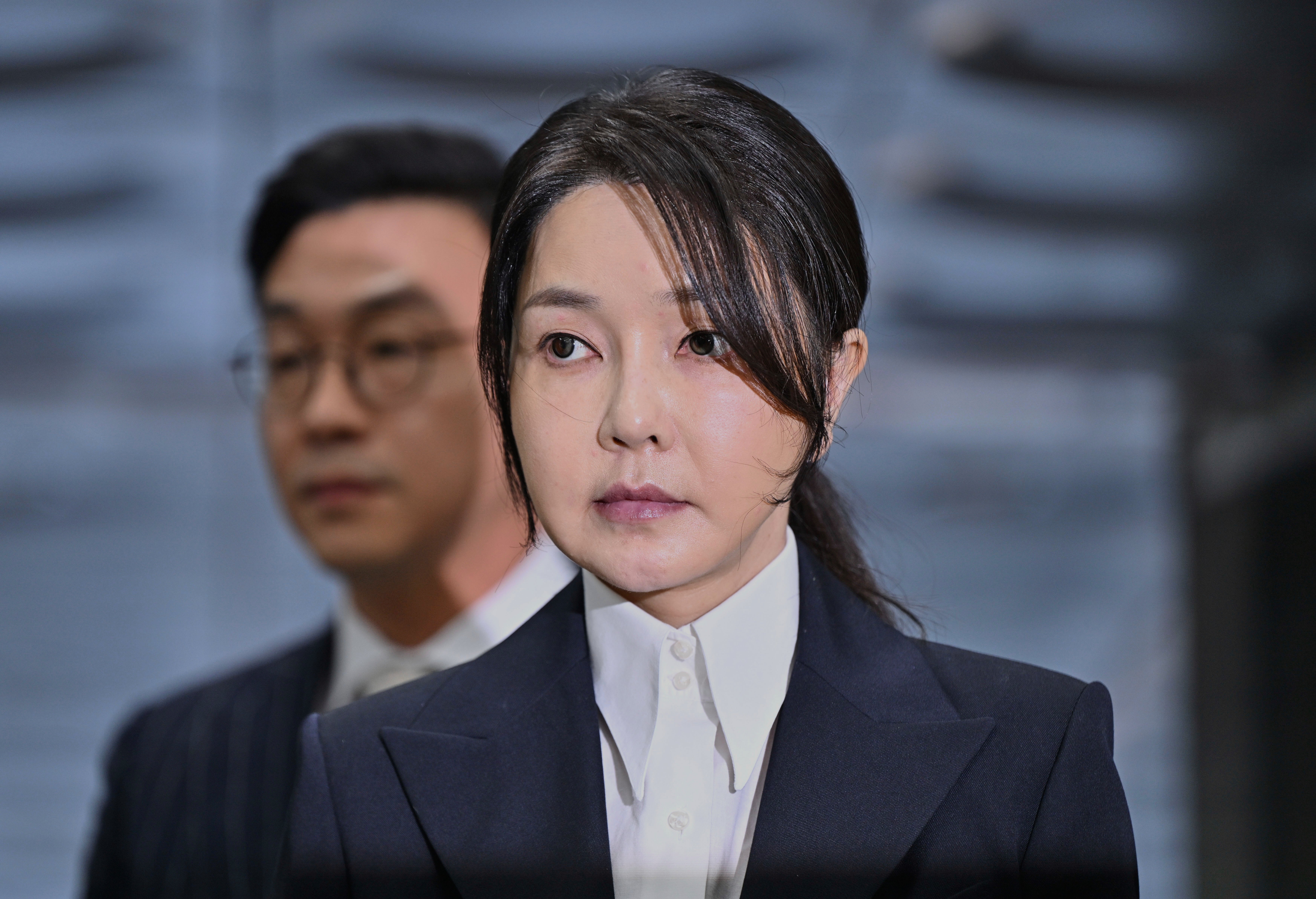 South Korea's former first lady Kim Keon Hee, wife of impeached former president Yoon Suk Yeol, arrives at a court to attend a hearing to review her arrest warrant requested by special prosecutors, in Seoul, South Korea