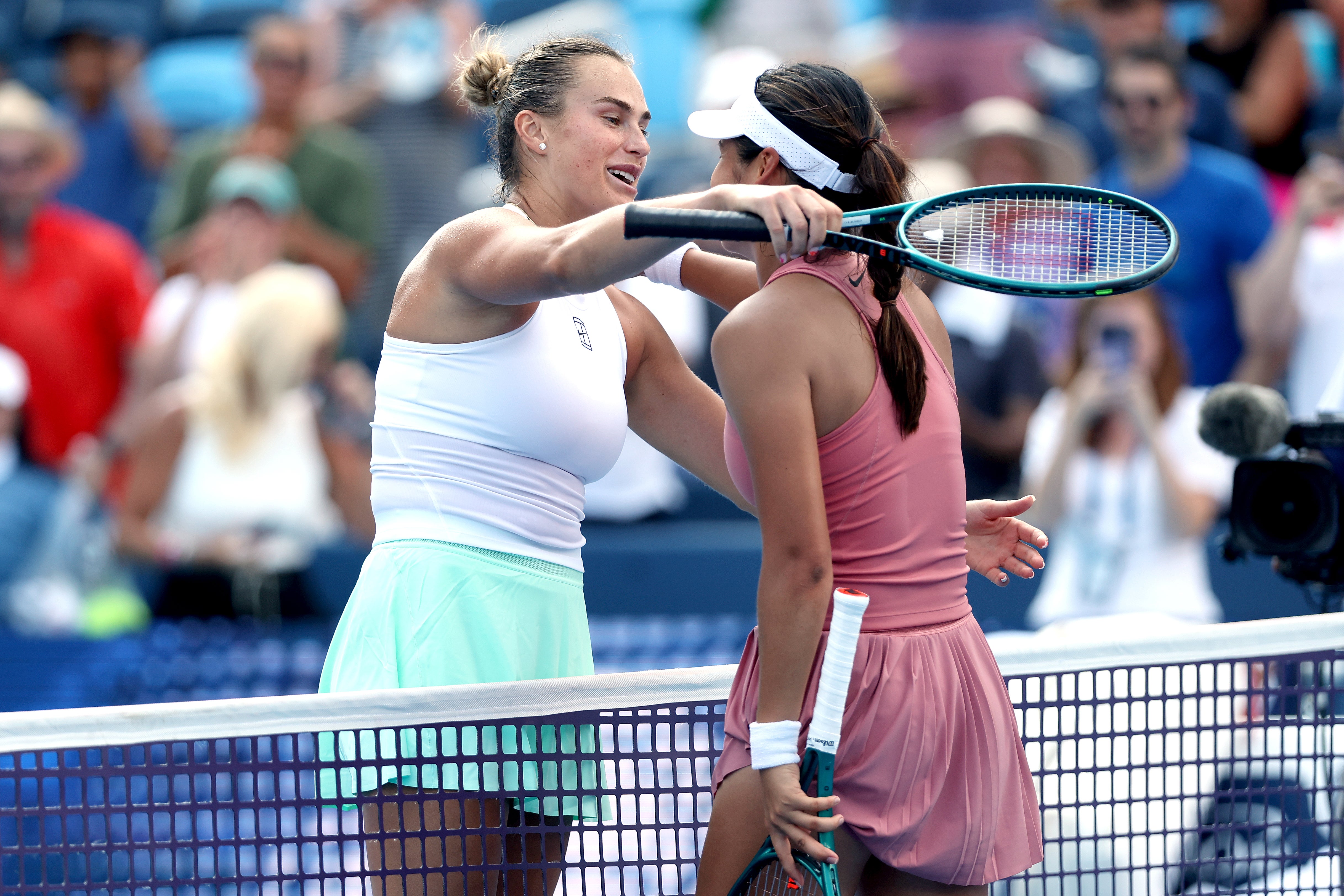 Aryna Sabalenka hugs Emma Raducanu after defeating her at the 2025 Cincinnati Open