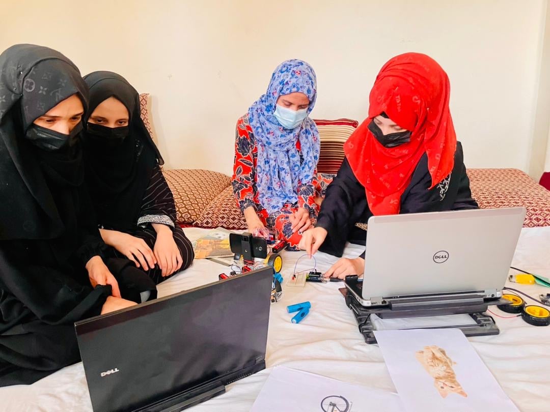 For Voices of Hope, tinkering with wires and batteries and listening to online lessons is about more than just robotics or AI