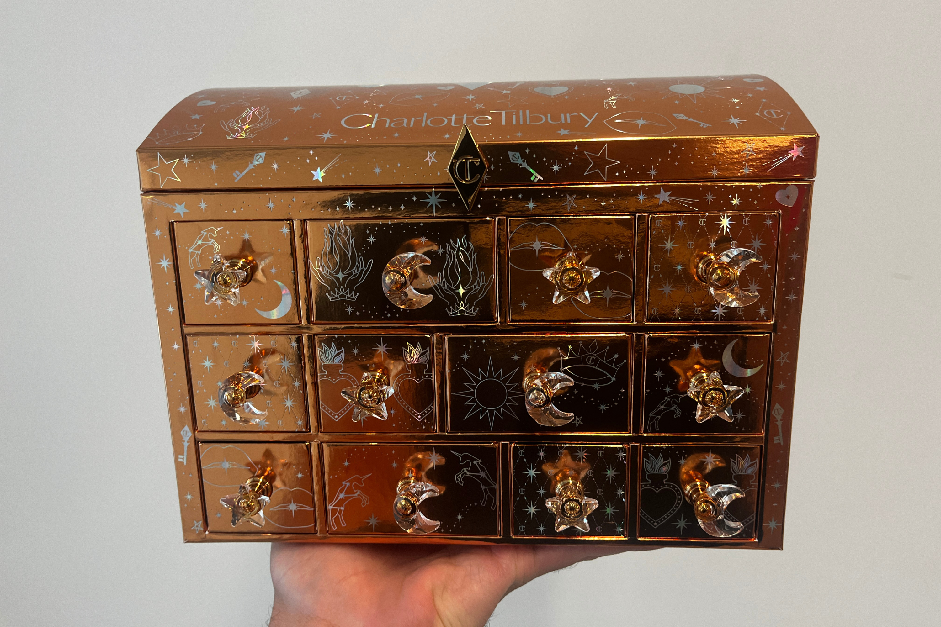 The calendar is packaged in a characteristically glamorous chest