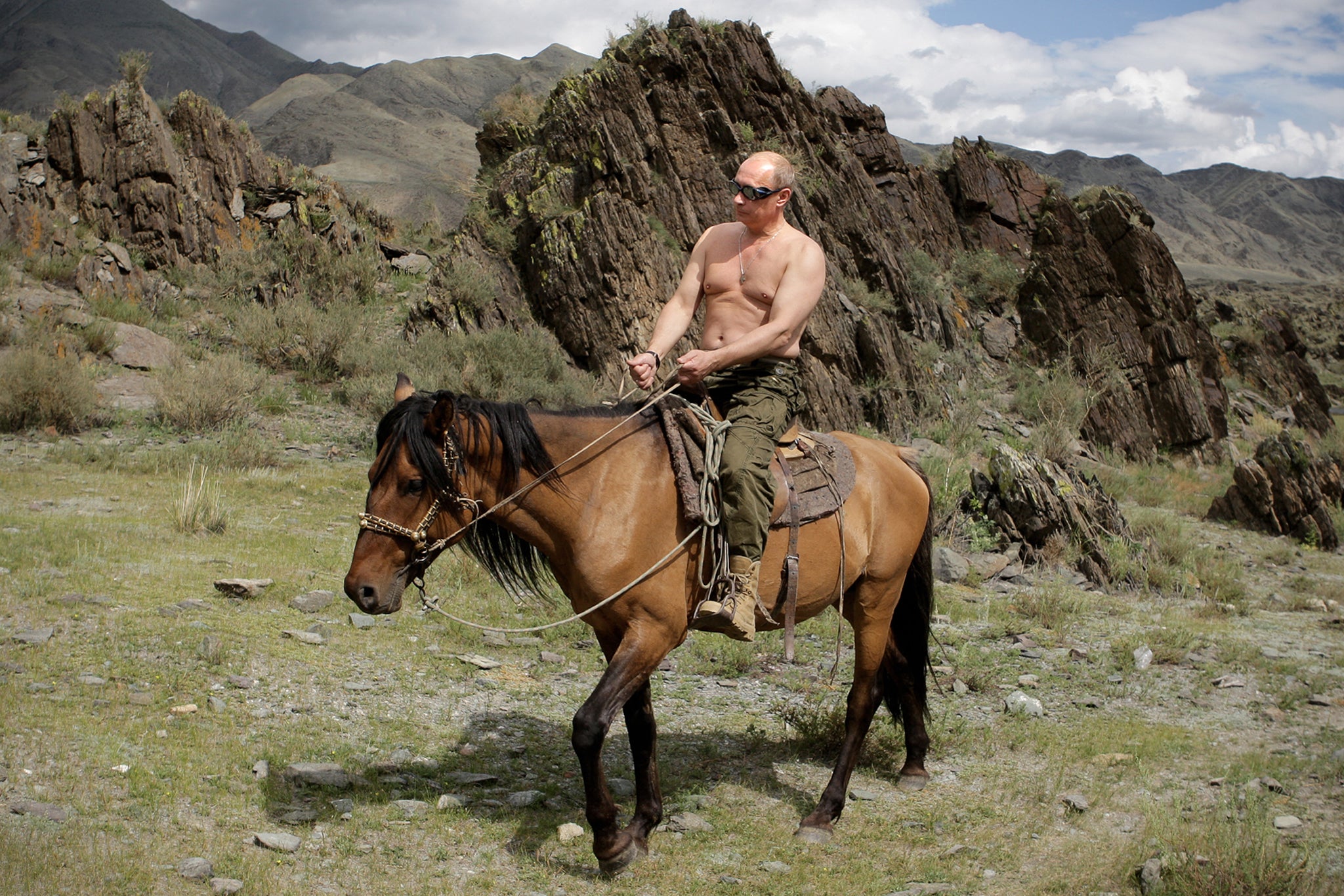 Putin rides a horse during his vacation outside the town of Kyzyl in southern Siberia in 2009