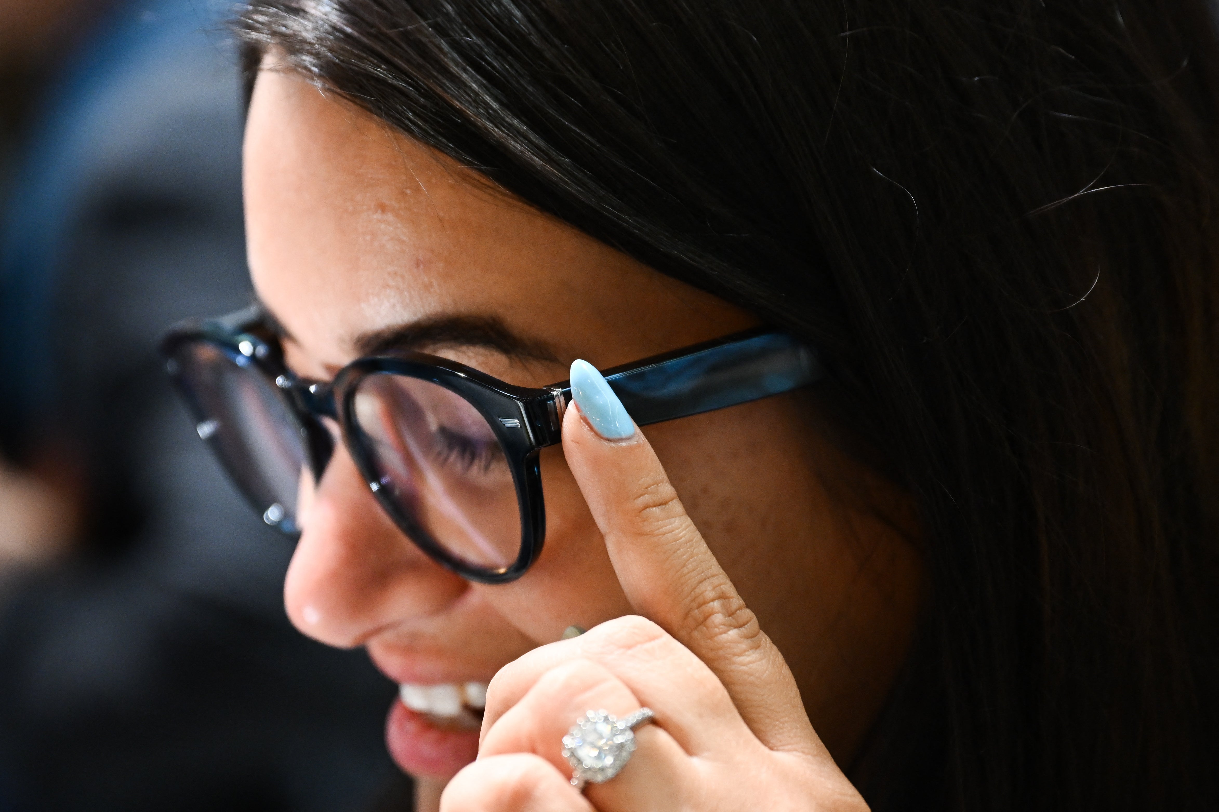 An attendee wears the Amazon Echo Frames smart glasses with Alexa during the Consumer Electronics Show (CES)