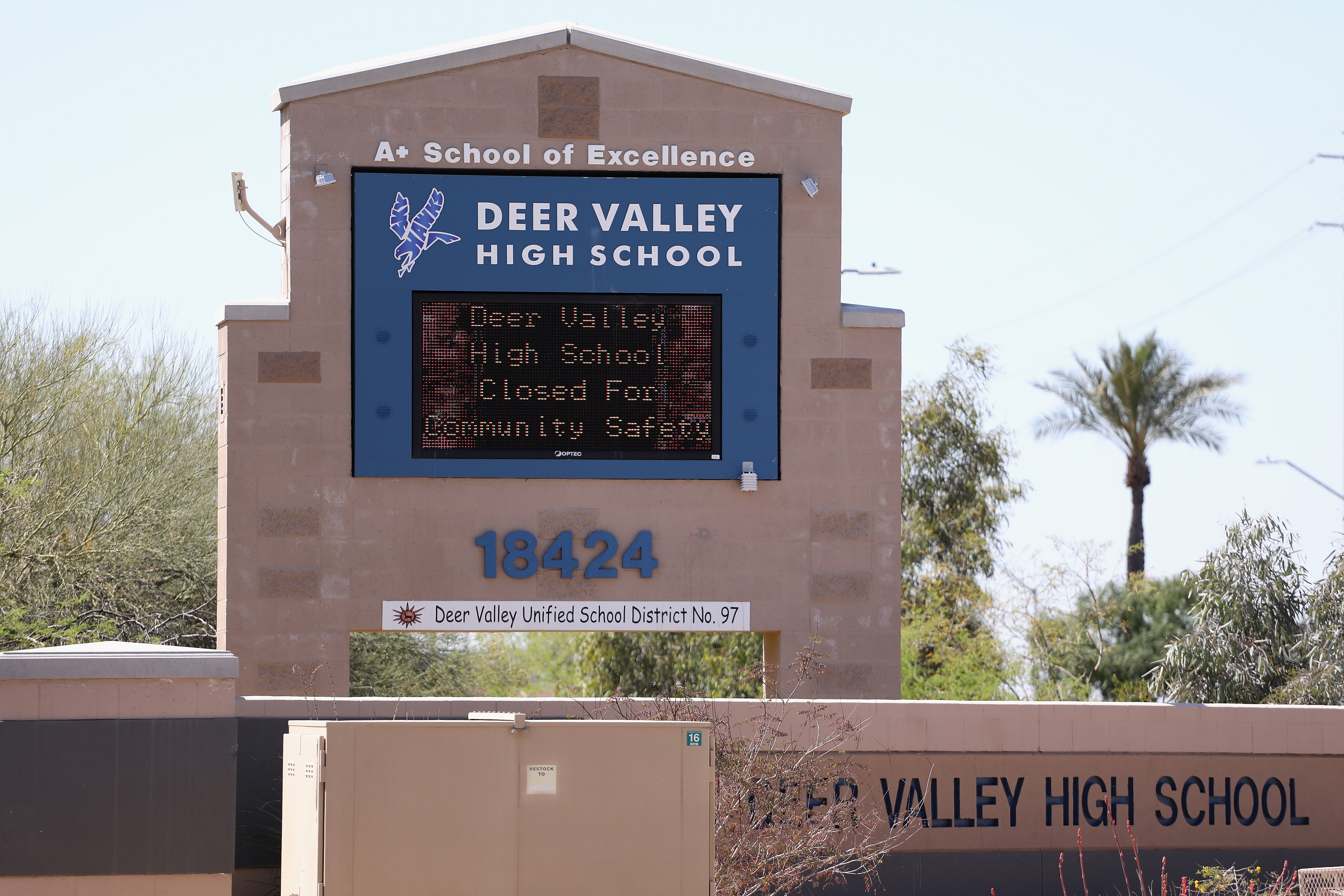 A sign at a Glendale, Arizona, high school says it’s closed amid the outbreak of Covid-19 in 2020. School closures resulted in negative mental health impacts in students, analyses have found