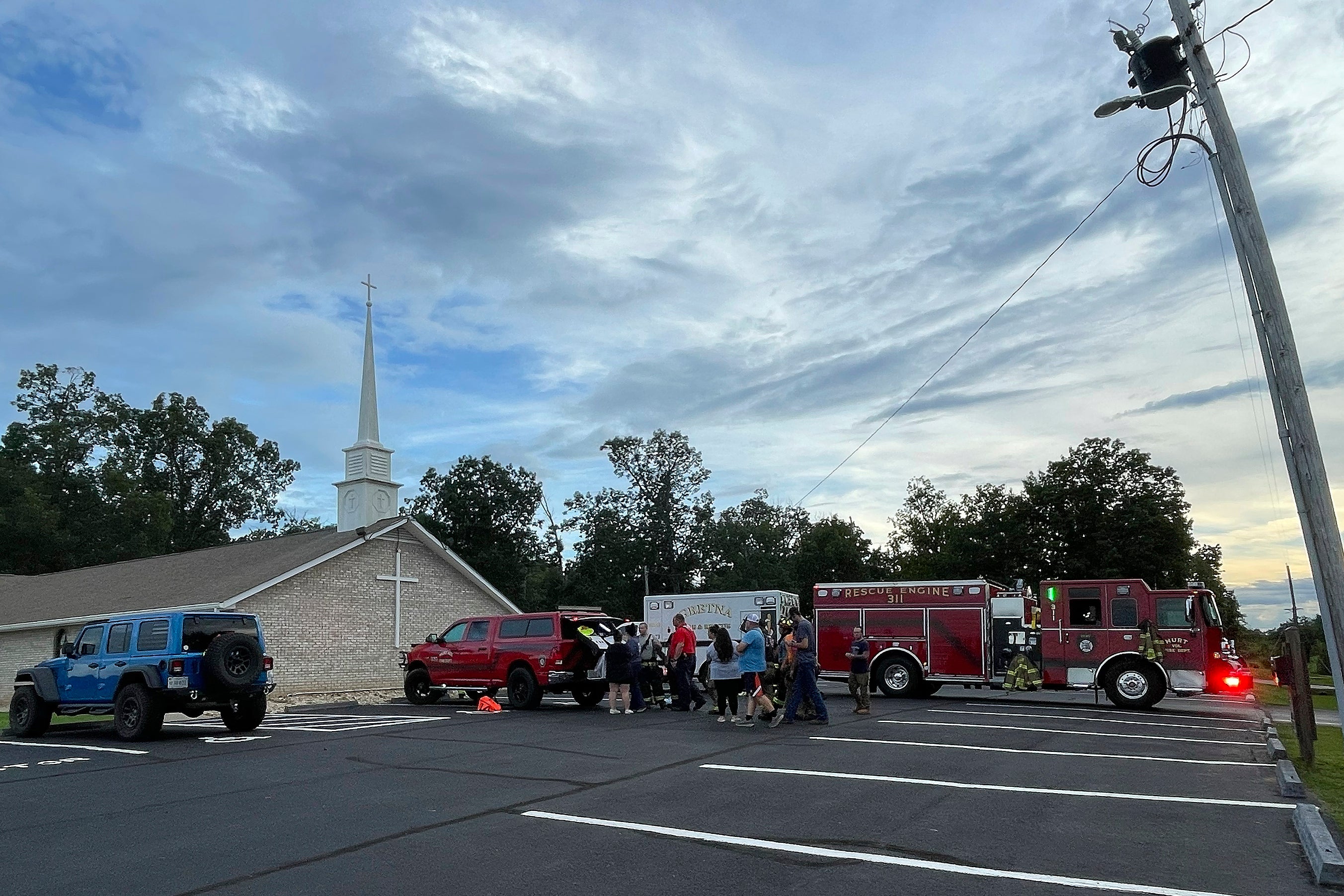 Law enforcement services assemble in response to an active shooting situation in Gretna, Va