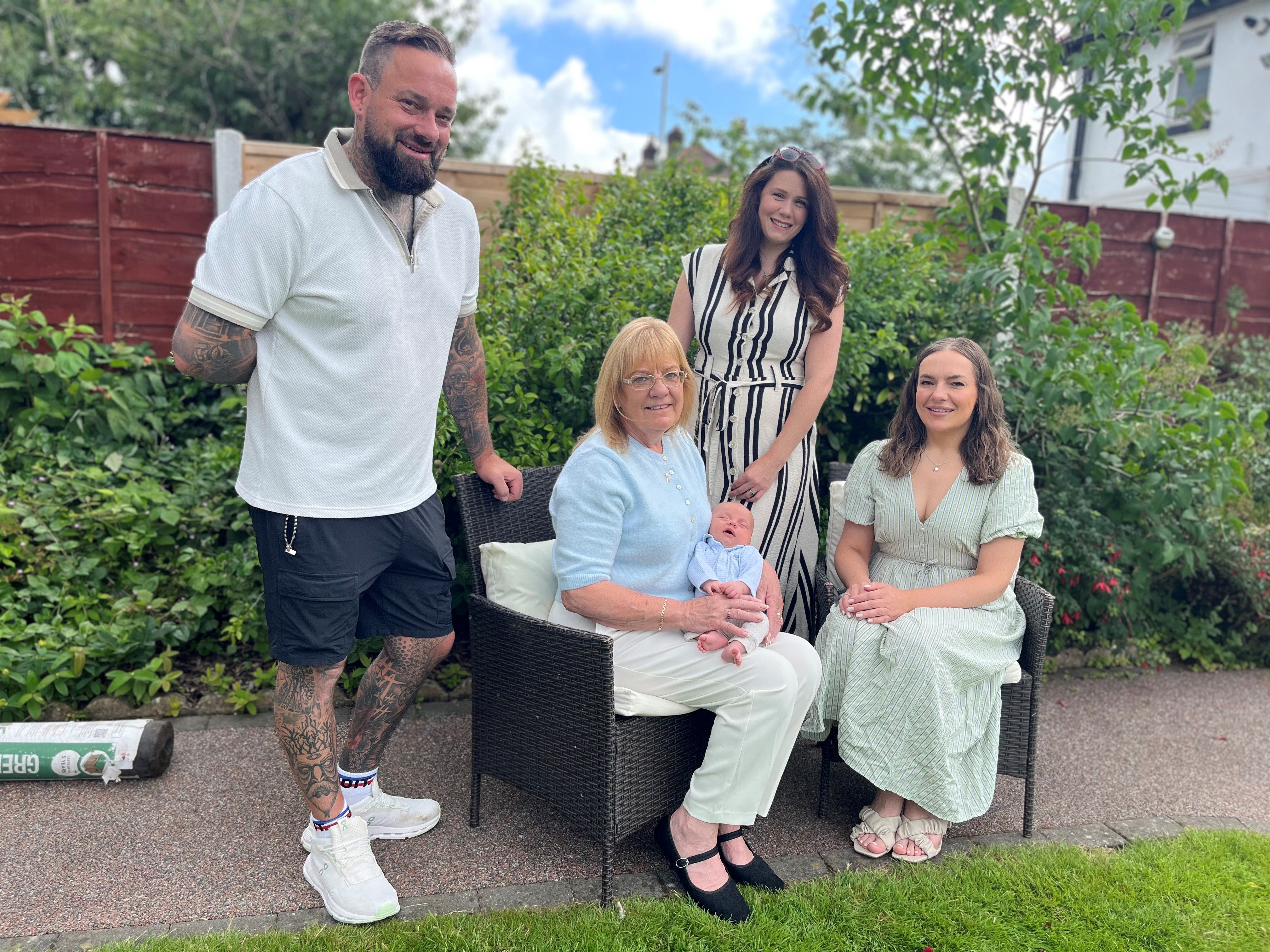 From left to right: Ann’s son Michael, Ann holding her grandson Arthur, Ann’s daughter-in-law Lauryn and Ann’s daughter Becky