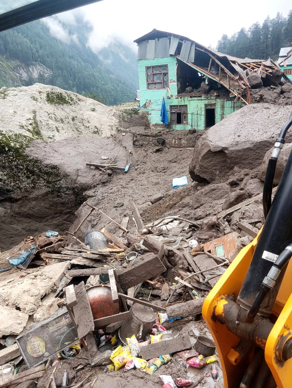 A building is left damaged by a flash flood in Chositi village of Kashmir on 14 August 2025