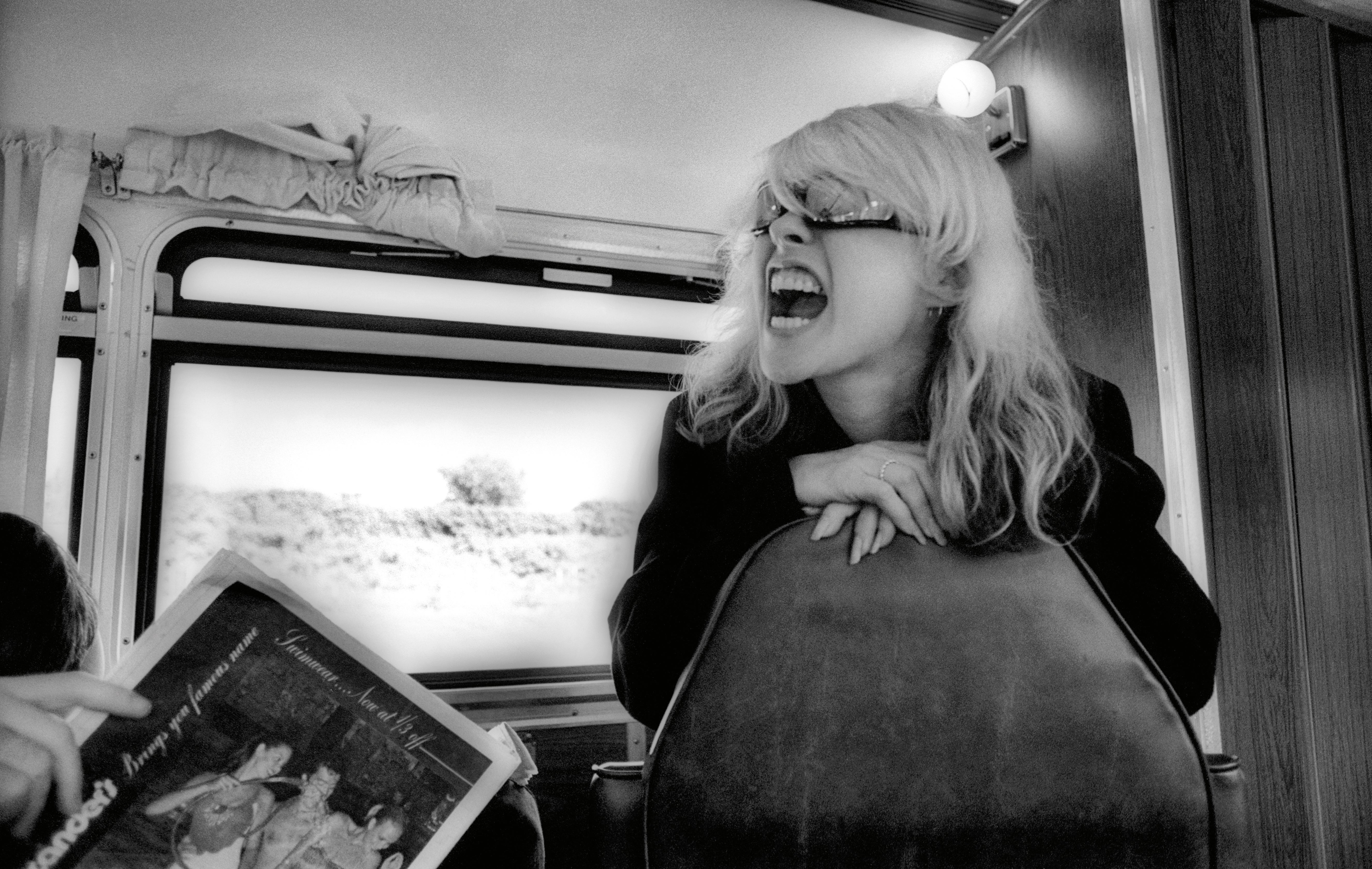 Debbie Harry of Blondie on a tour bus travelling from New York to Philadelphia, where the band were booked to support Alice Cooper