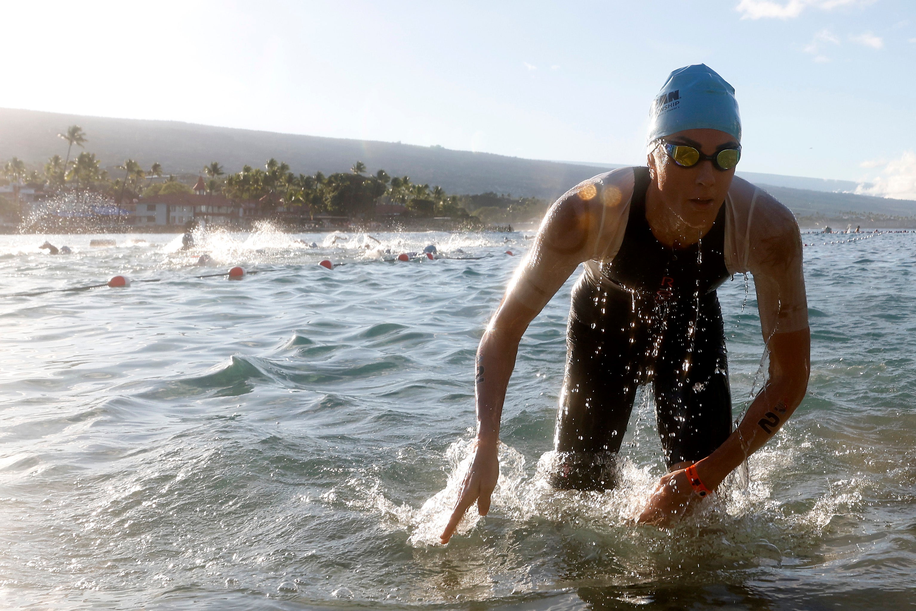Charles-Barclay emerges from the swim leg at Kona