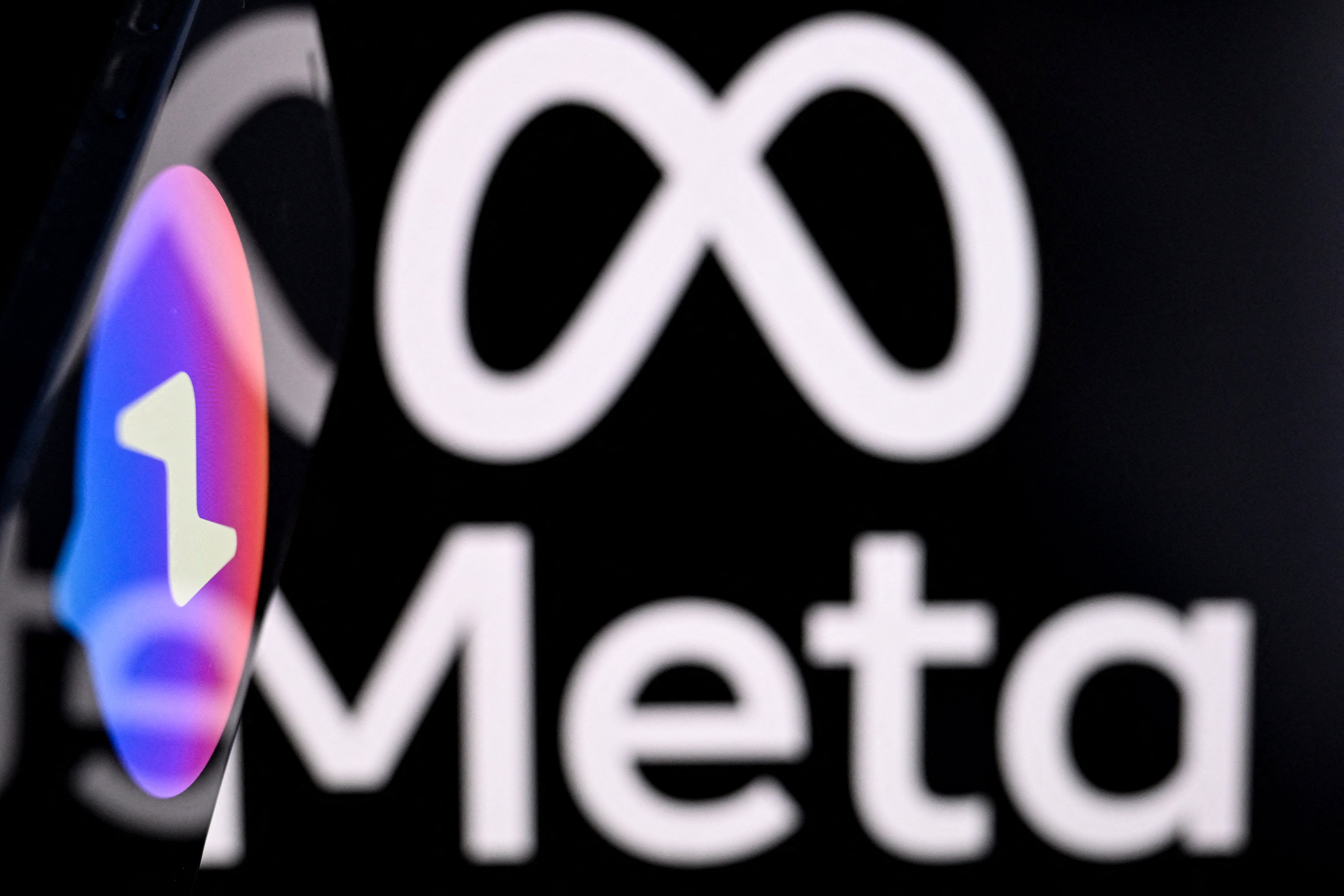 The logos of Facebook Messenger and parent company Meta