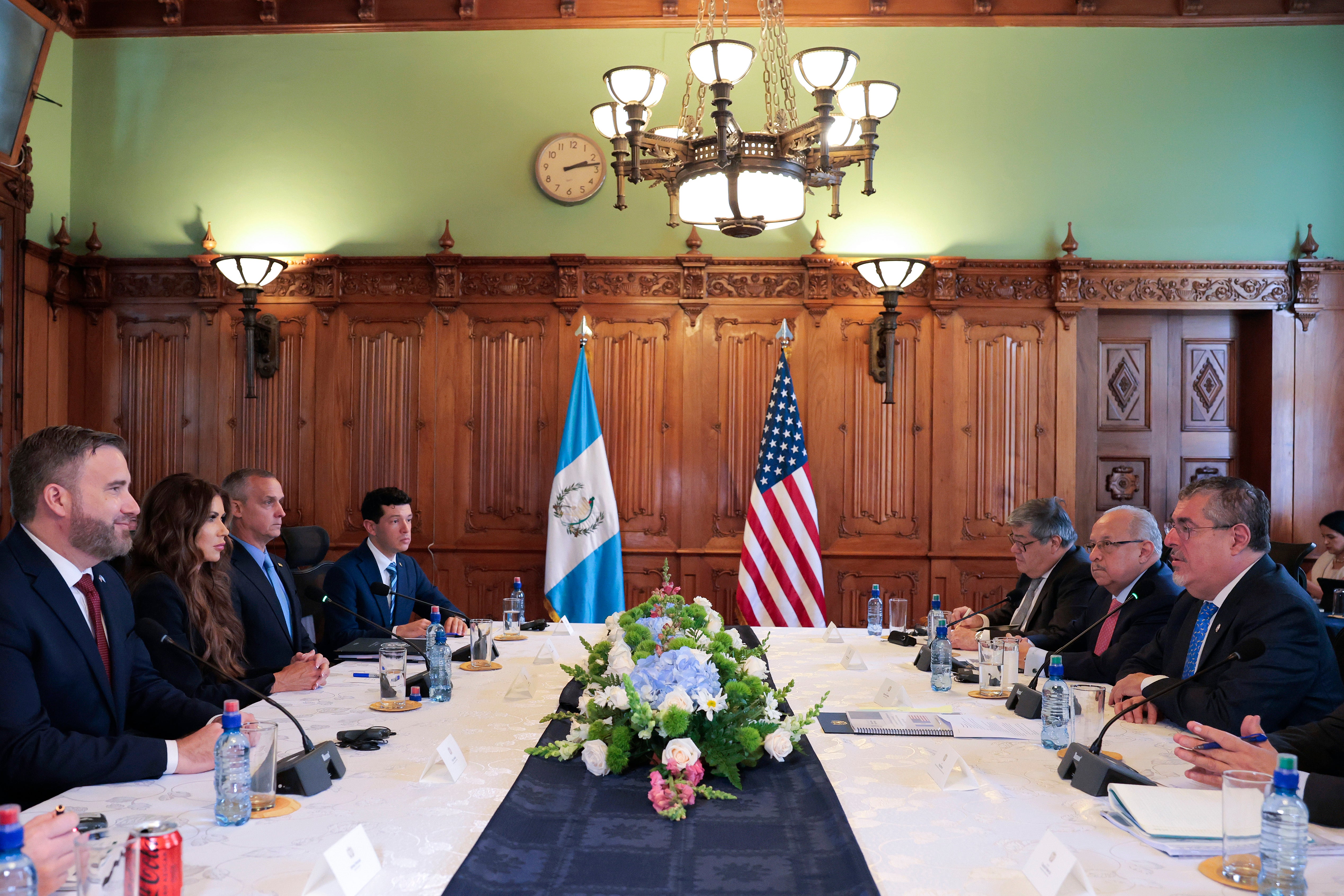 Lewandowski pictured to the right of Noem at a meeting in Guatemala about the administration's immigration policies