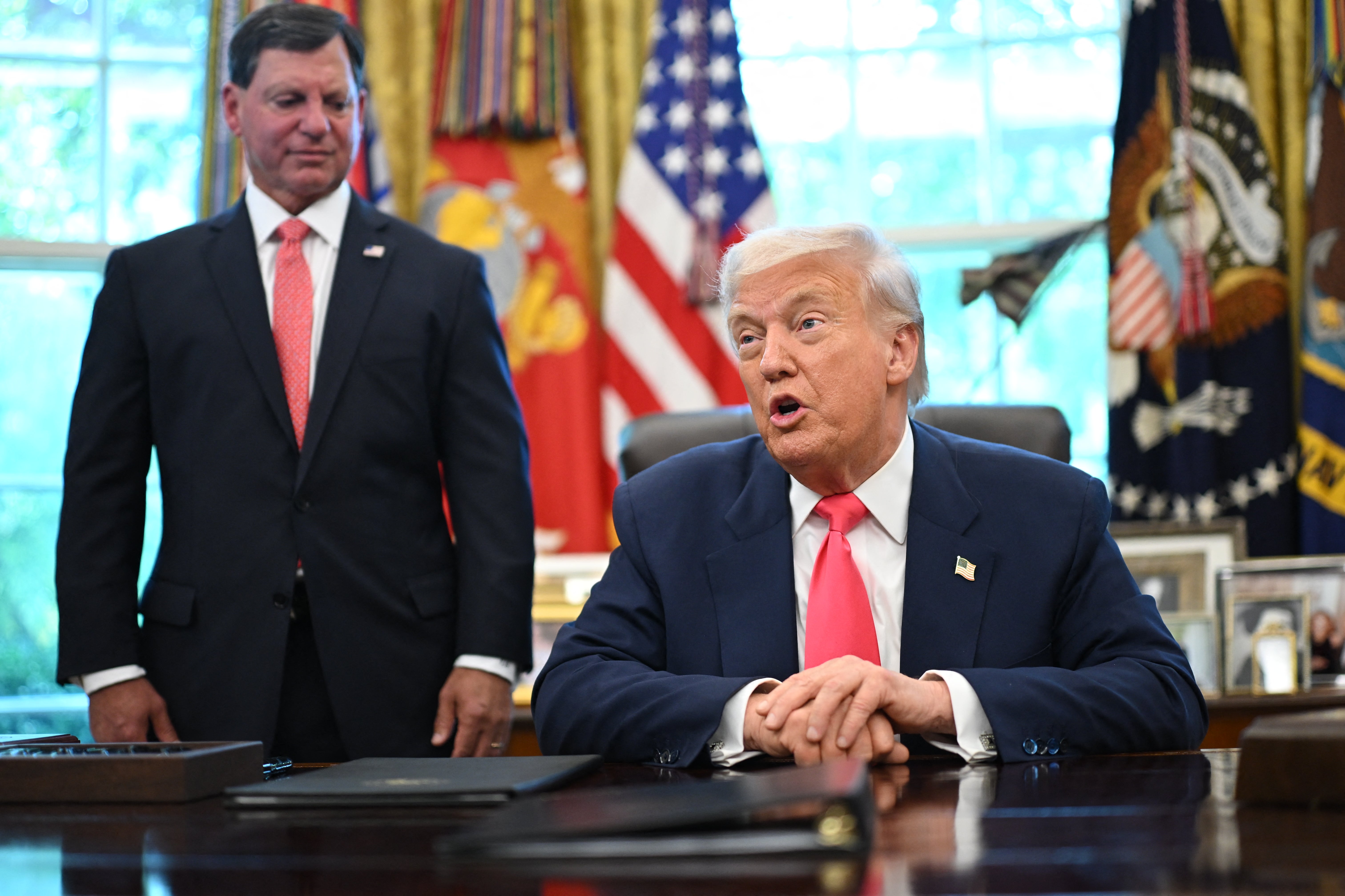 SSA Commissioner Frank Bisignano (left) walked back comments that the Trump administration is considering raising the retirement age, which currently stands at 67