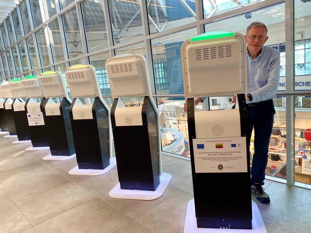 Our correspondent pictured at Vilnius airport, where new kiosks have been installed ahead of the launch of the new entry-exit system