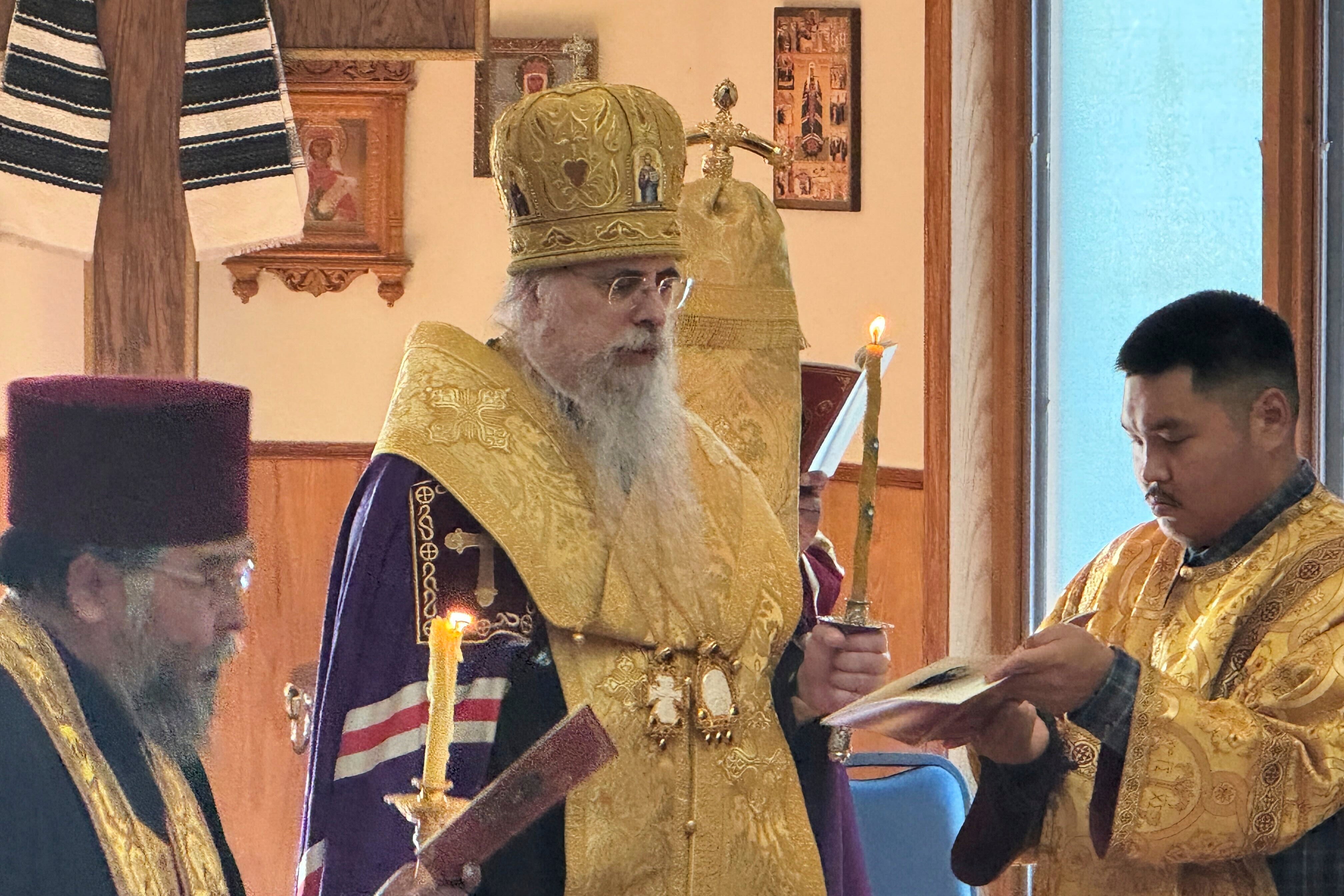 Archbishop Alexei of the Diocese of Sitka and Alaska, center, leads a prayer service for peace in the Russia-Ukraine War at the Saint Innocent Cathedral in Anchorage, Alaska, ahead of a US-Russia summit