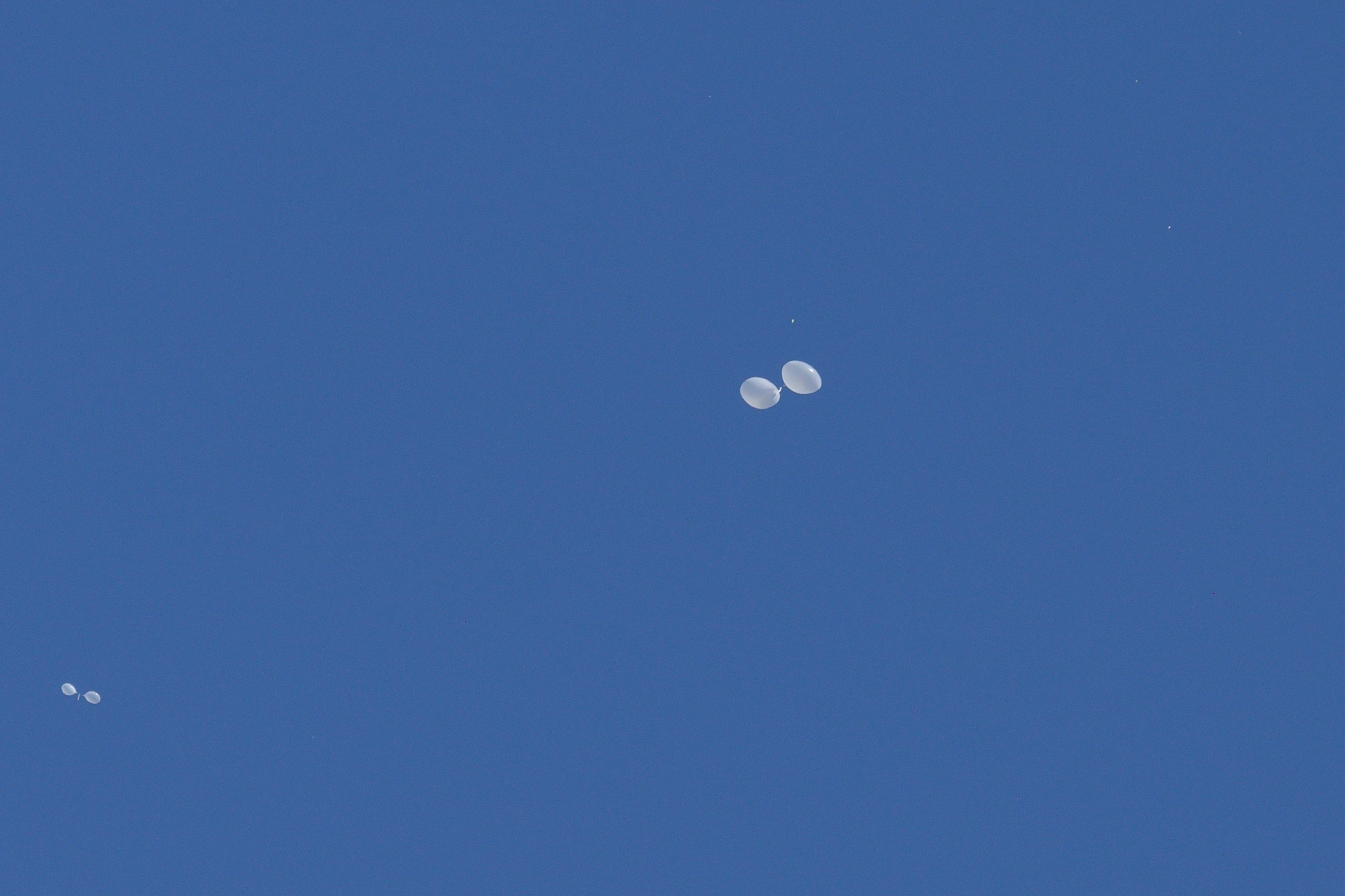 File. Balloons carrying trash launched from North Korea float in the sky above Seoul on 4 October 2024