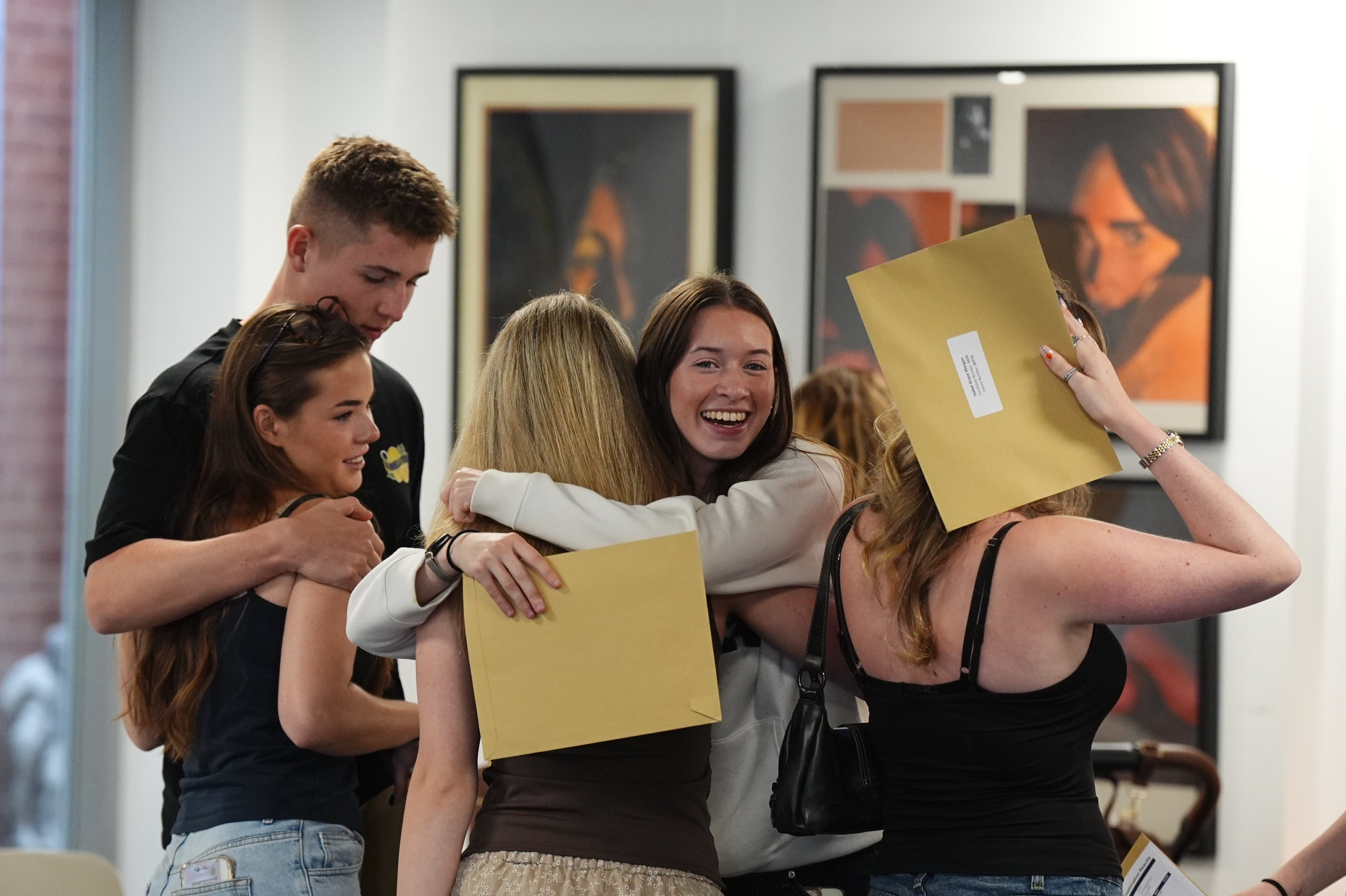 Students receive their A-level results at Solihull School on Thursday