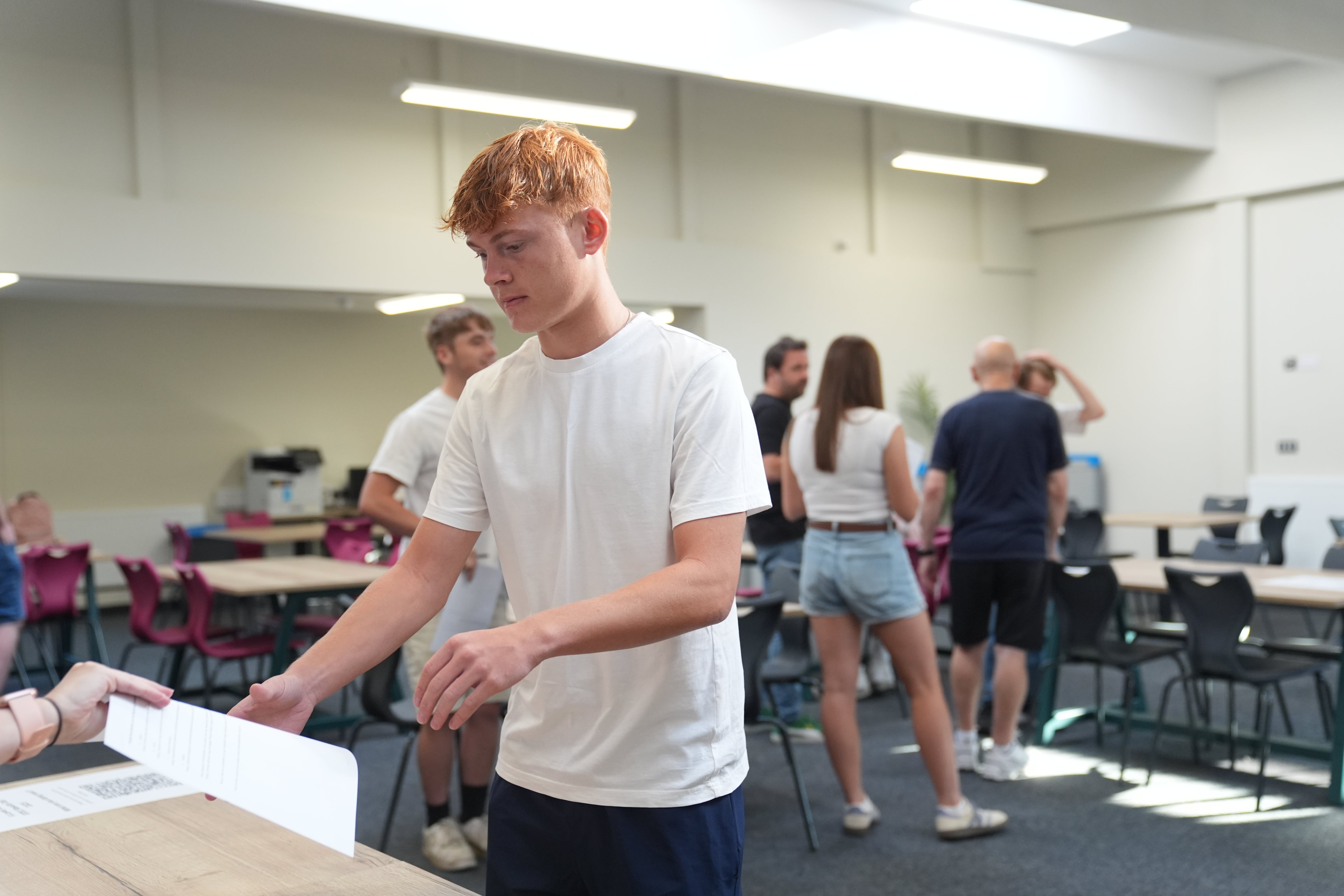 Students receive their A-level results at Ark Academy in London on Thursday