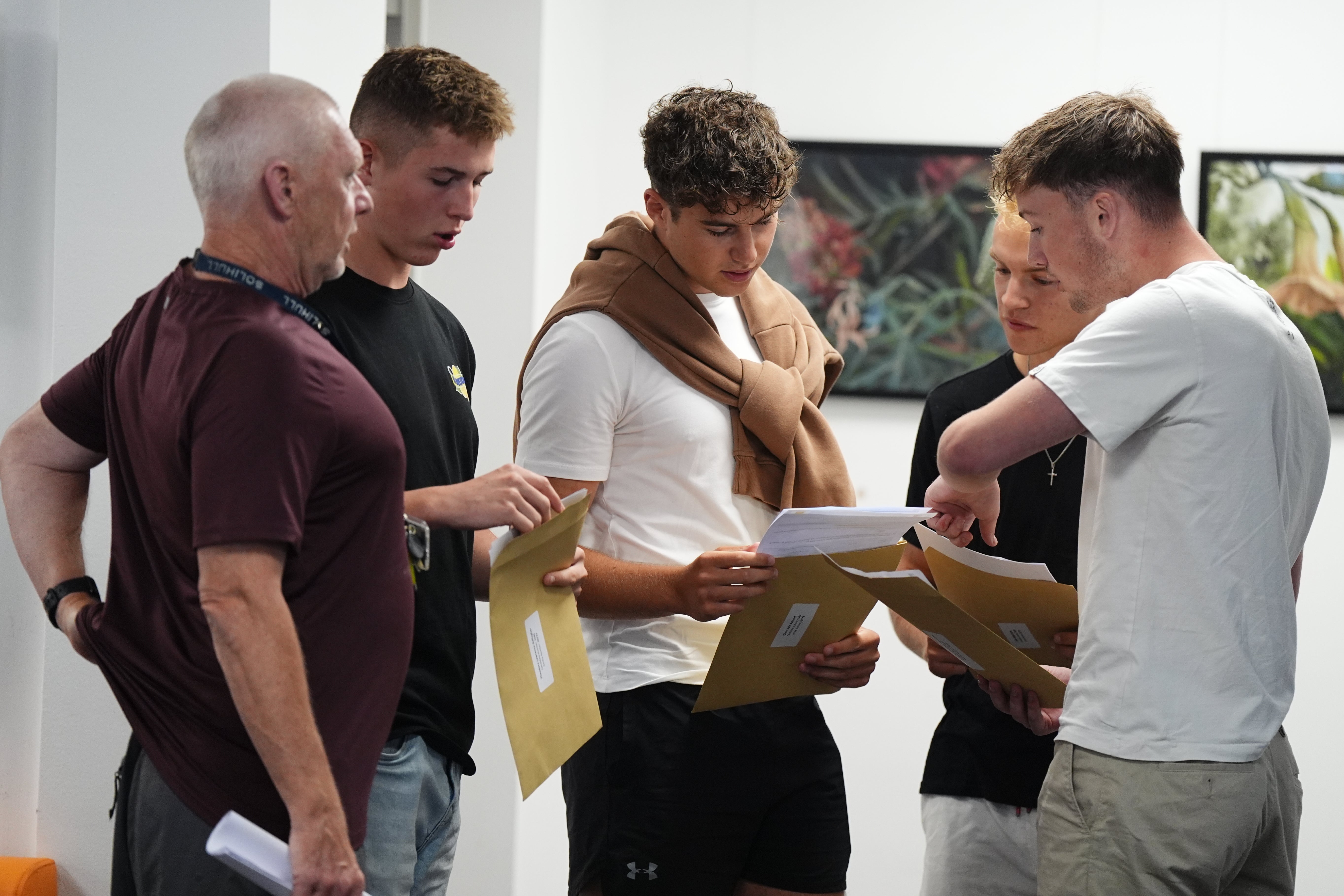 Students receive their A-level results at Solihill School on Thursday