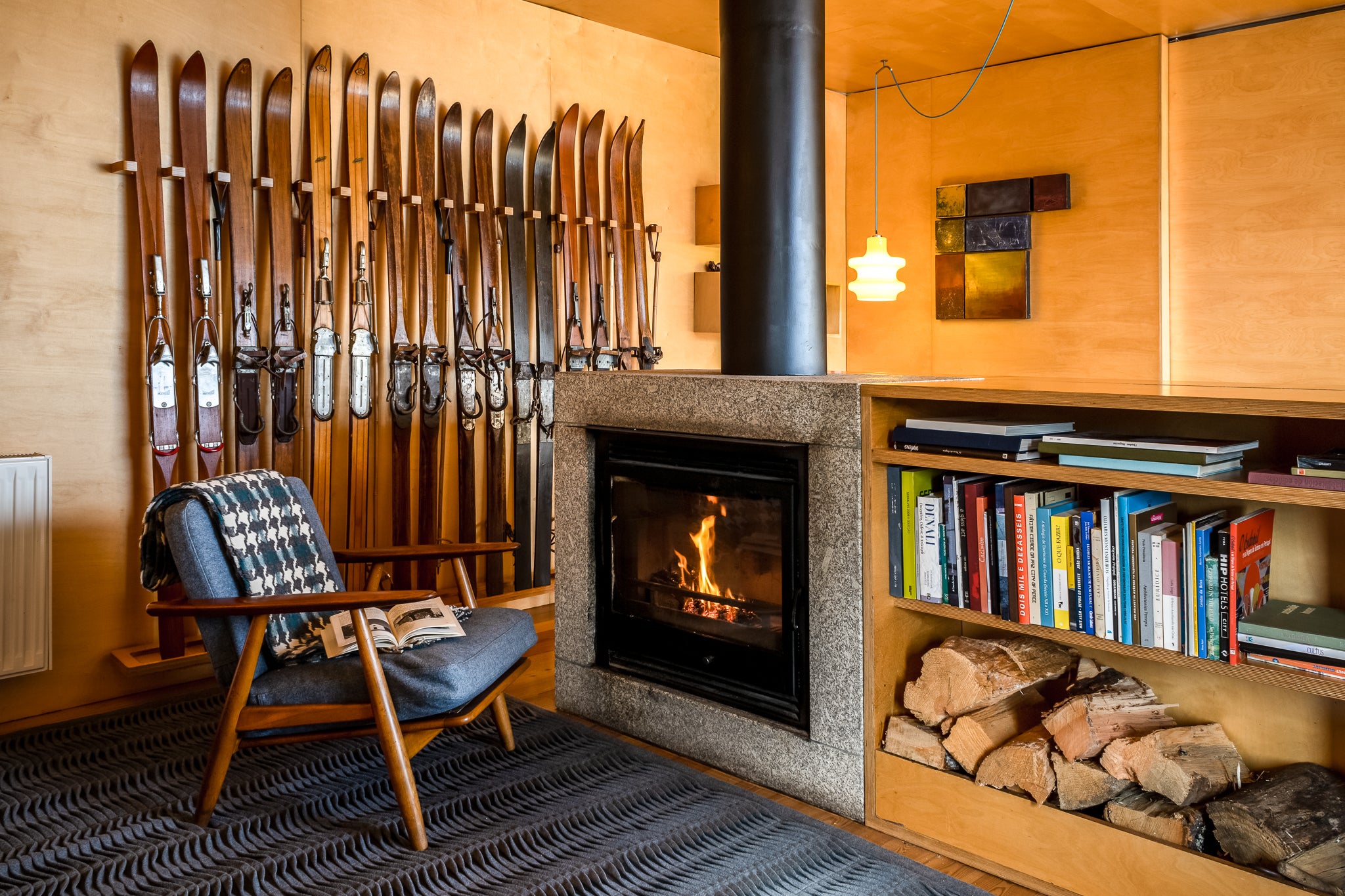 Much like in the Alps, hotels such as Casa das Penhas Douradas in Portugal have welcoming fireside spots and vintage skis for decoration