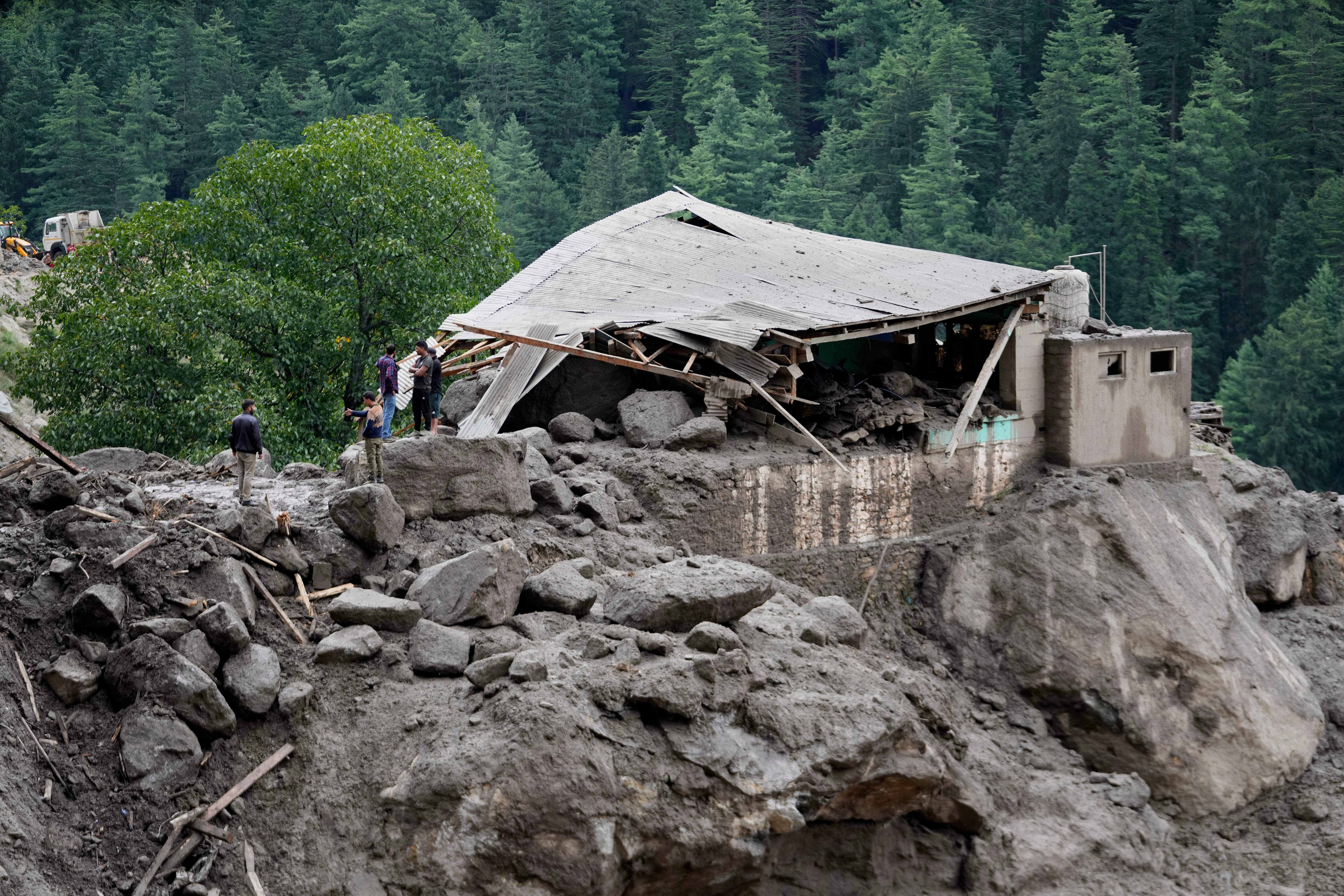 A building damaged by Thursday's flash floods is seen in Chositi village, Kishtwar district, Indian-controlled Kashmir, Friday, Aug. 15, 2025. (AP Photo/Channi Anand)