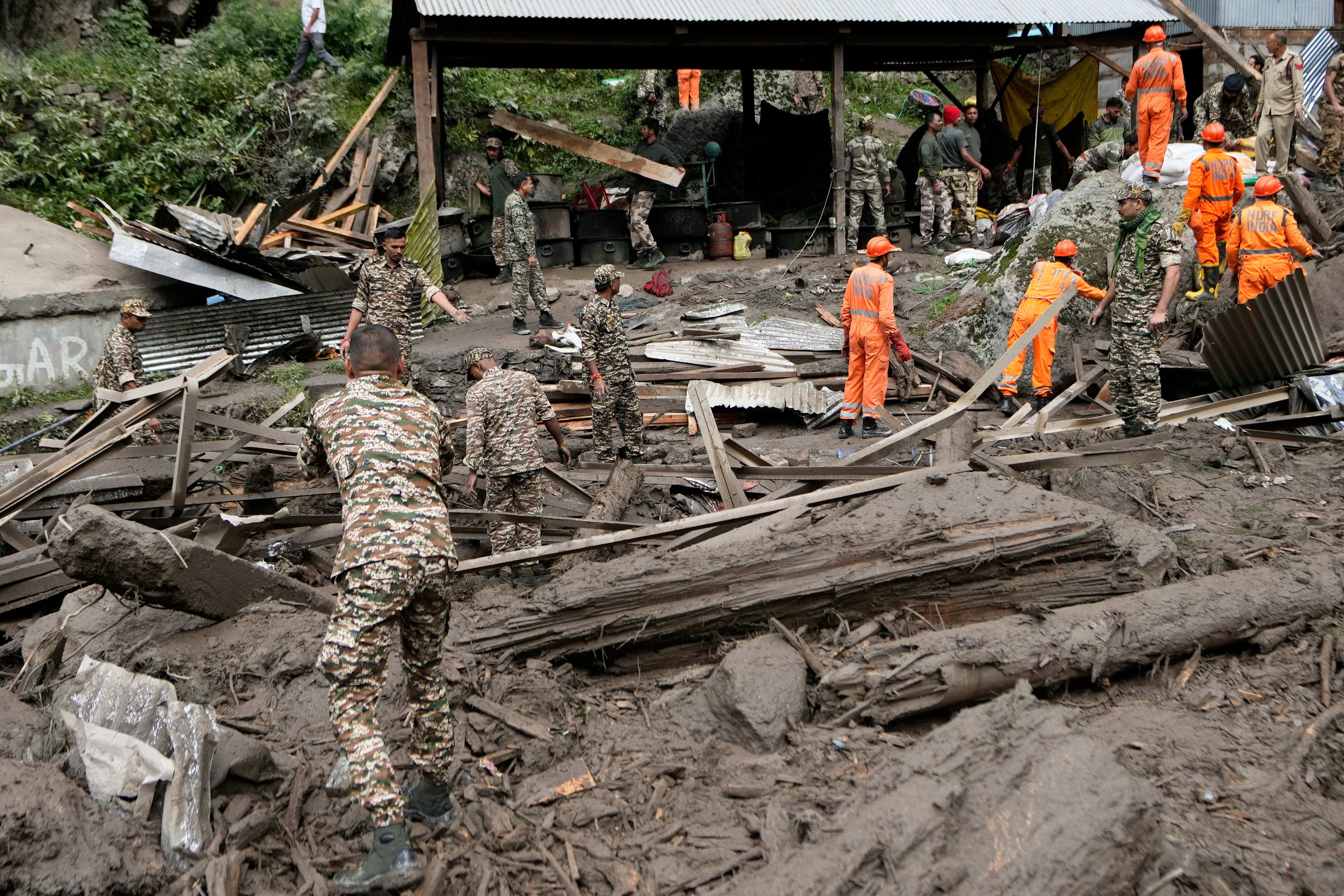 Rescuers search for missing flash flood victims in remote Kashmir village