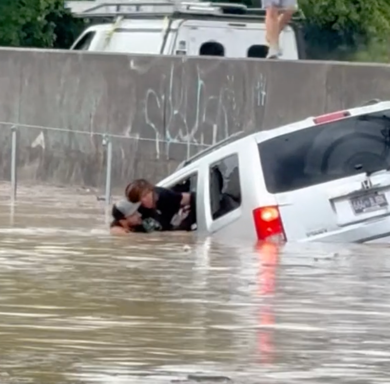 Dramatic rescue as woman pulled from car in Tennessee floodwaters