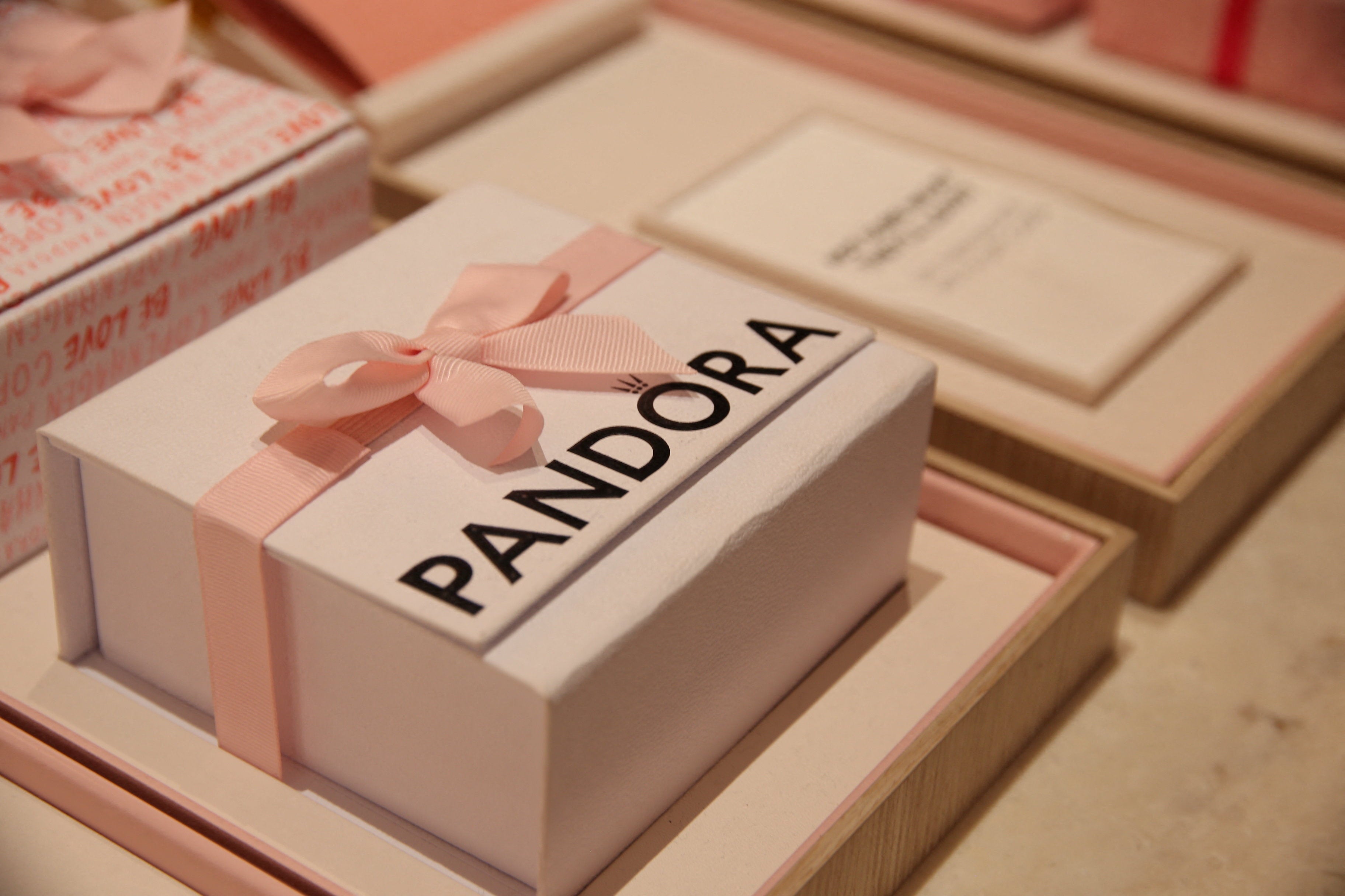 Pandora said the latest results came 'despite a tough consumer backdrop combined with significant headwinds from foreign exchange rates, commodity prices and tariffs'