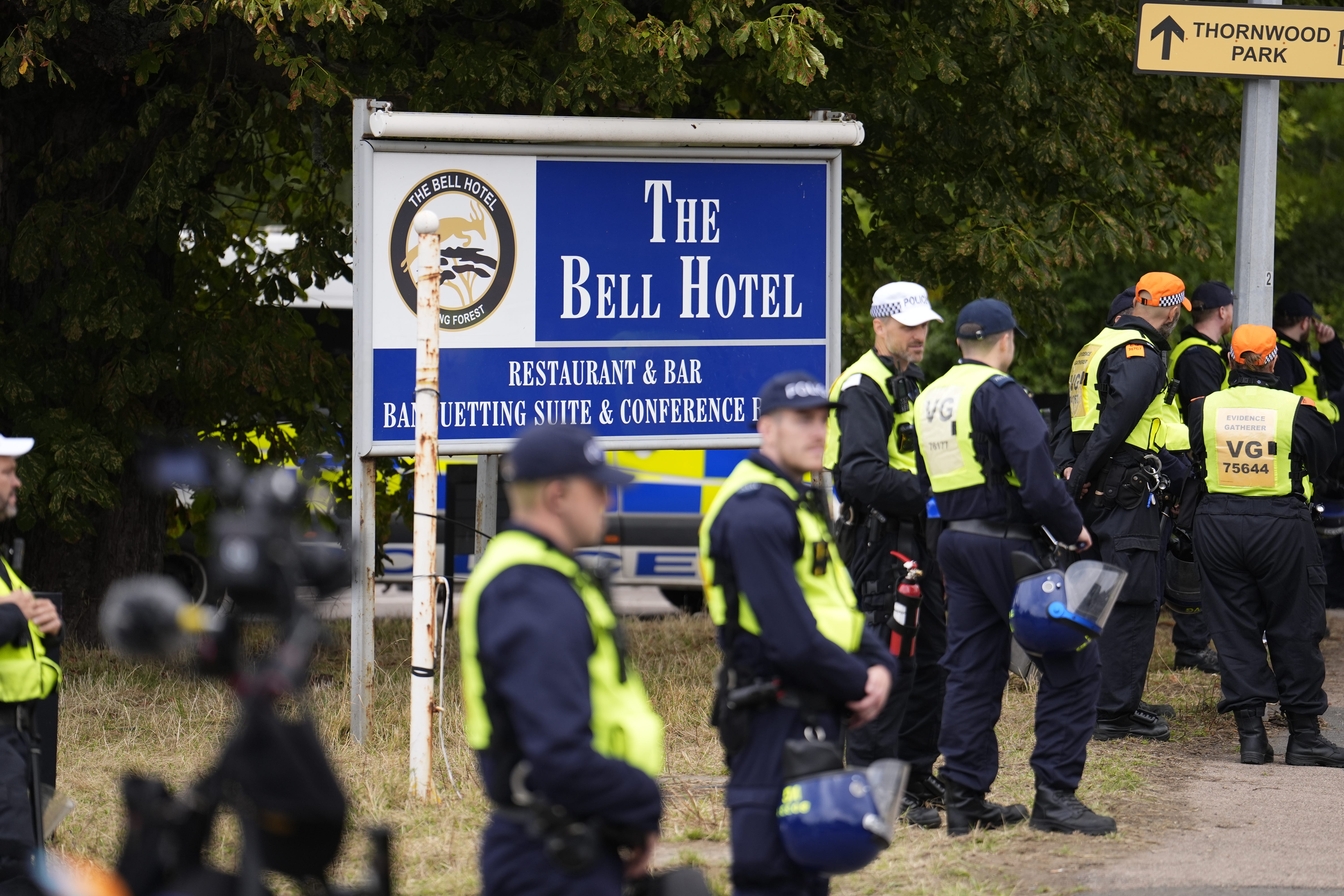 Police officers outside the Bell Hotel in Epping during a protest over asylum seekers being housed at the site (Jordan Pettitt/PA)