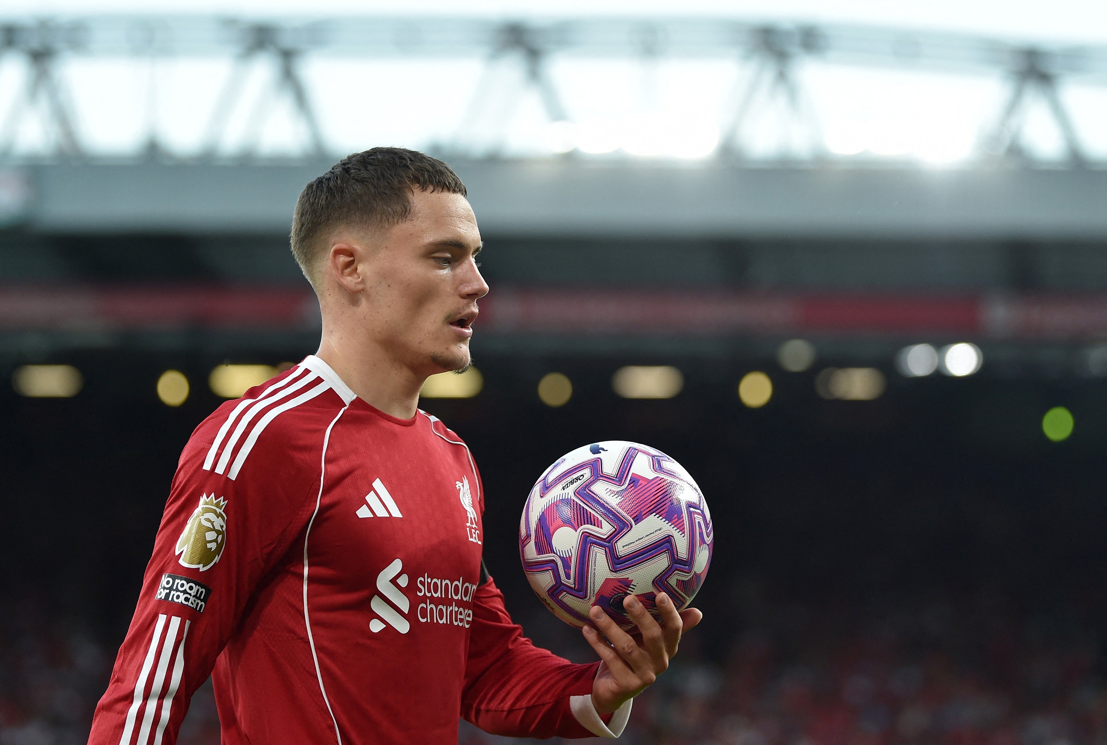 Florian Wirtz takes a corner for Liverpool