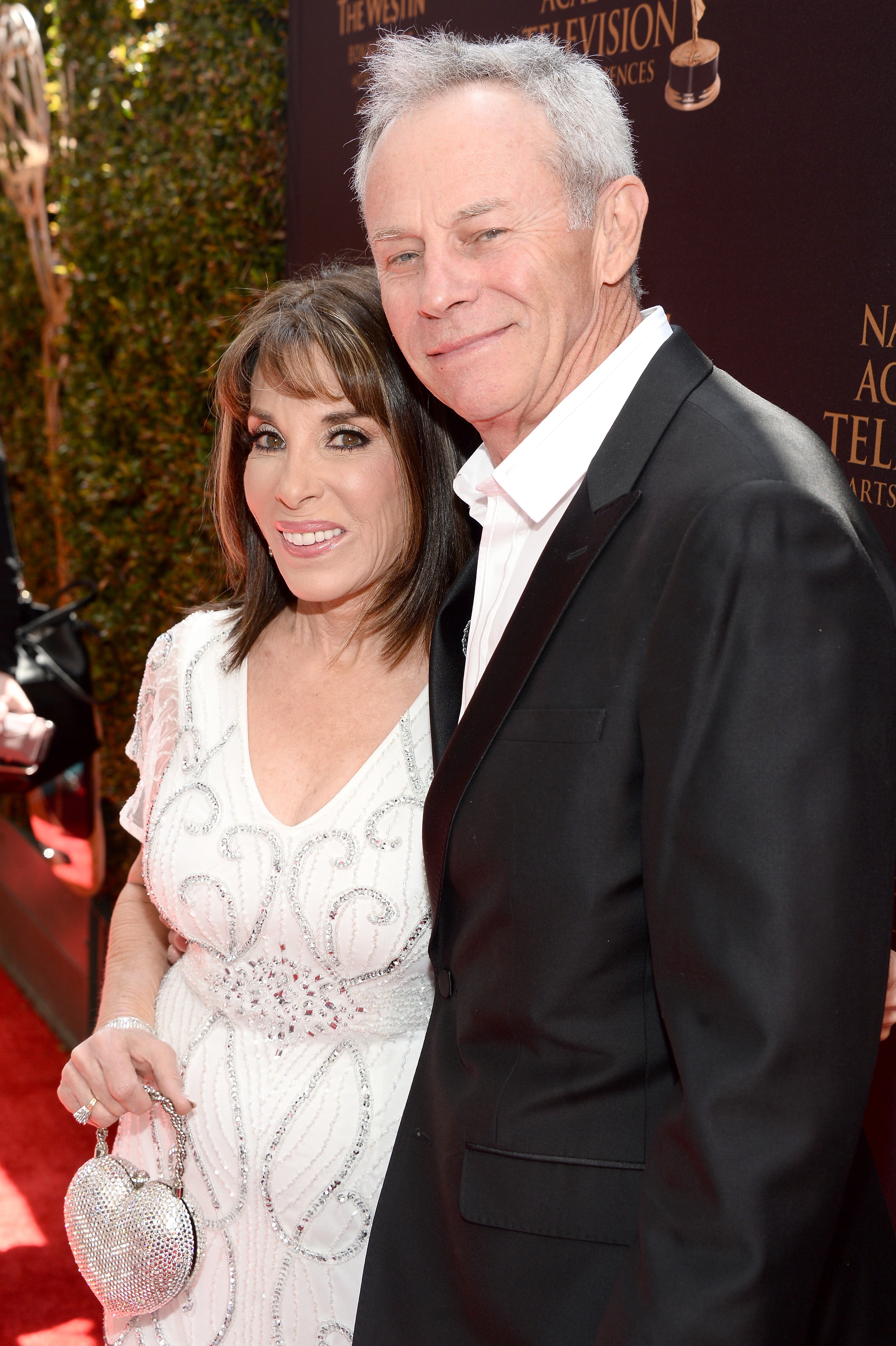 Actors Tristan Rogers and Kate Linder walk the red carpet at the 43rd Annual Daytime Emmy Awards at the Westin Bonaventure Hotel on May 1, 2016 in Los Angeles