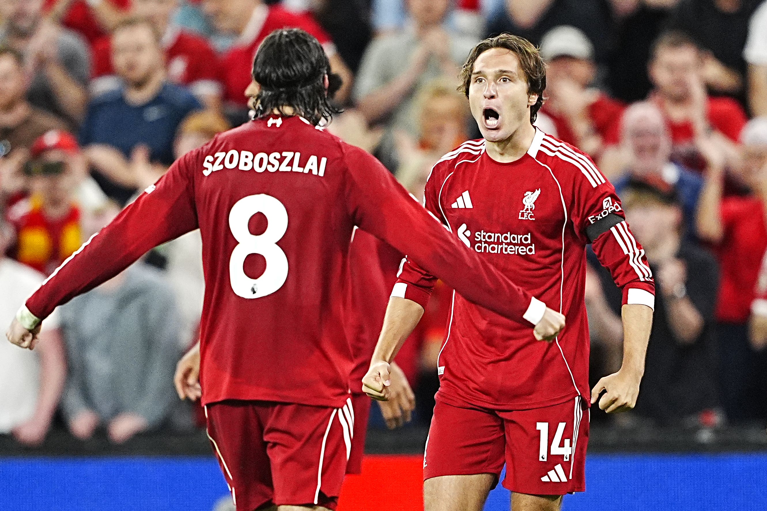 Liverpool’s Federico Chiesa (right) celebrates scoring their side’s third goal of the game with team-mate Dominik Szoboszlai during the Premier League match at Anfield, Liverpool. Picture date: Friday August 15, 2025.