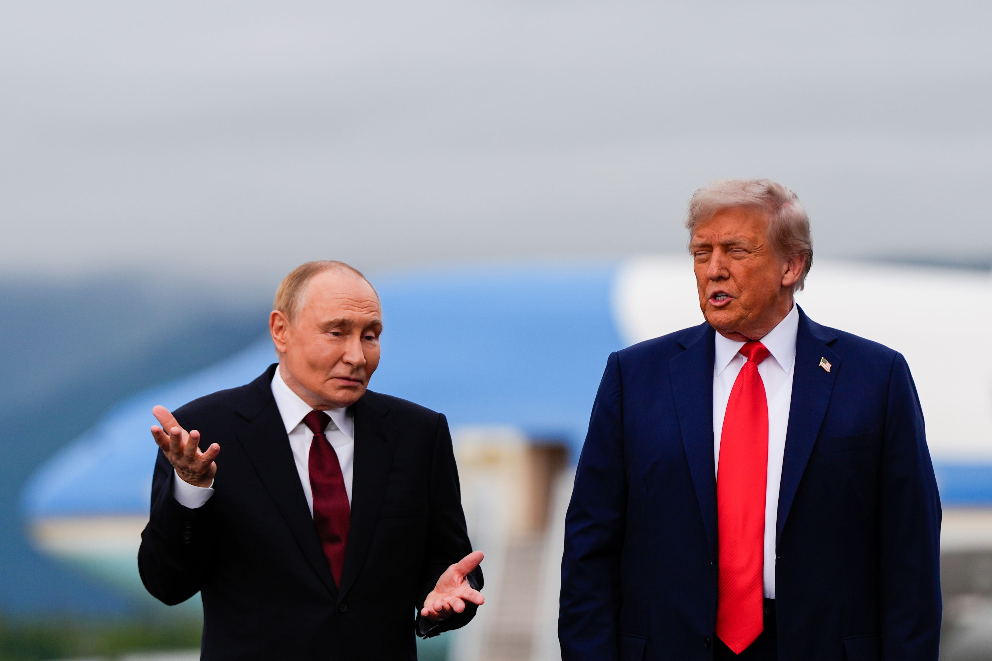 US President Donald Trump with Russian President Vladimir Putin (Julia Demaree Nikhinson/AP)