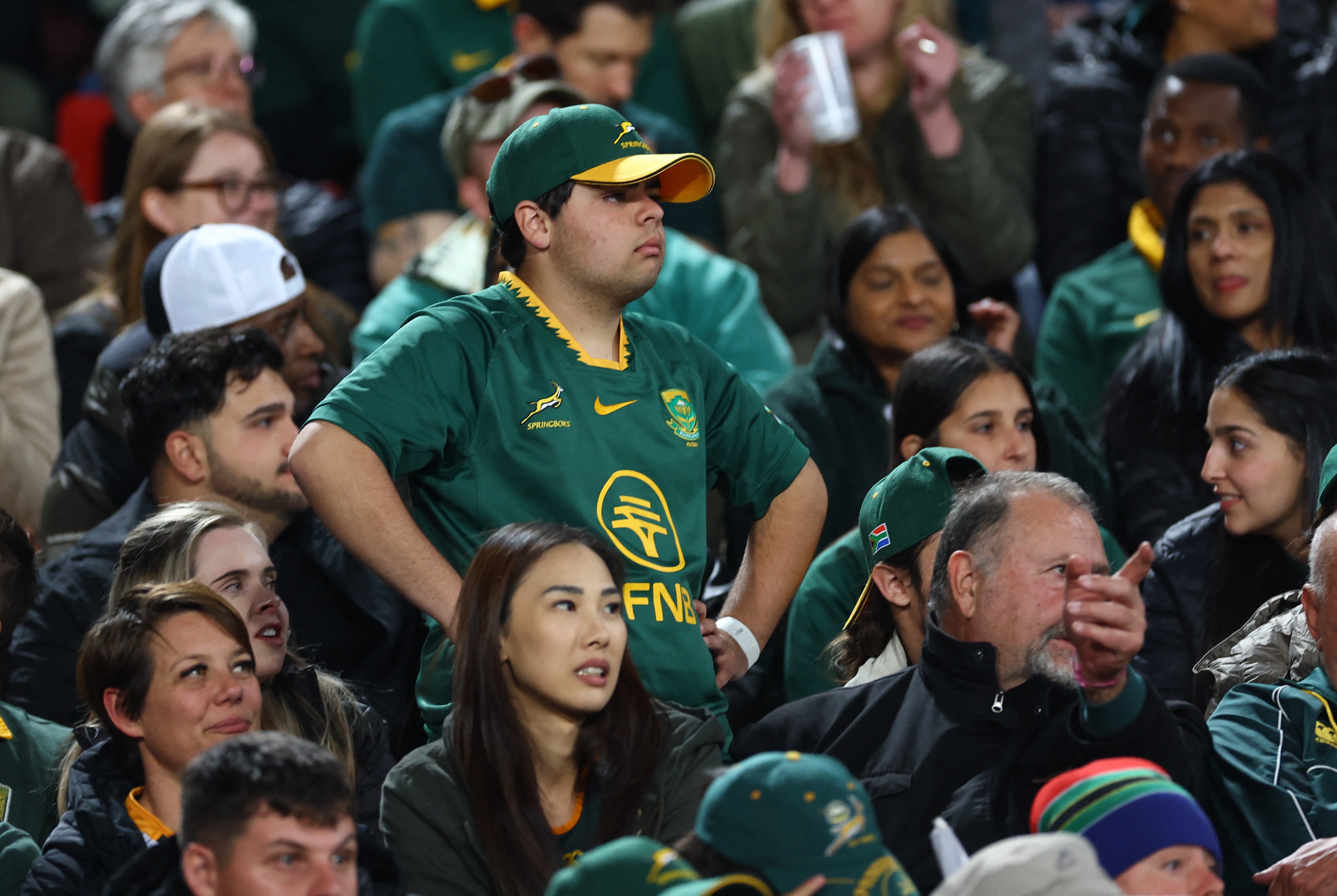 A South African fan watches on